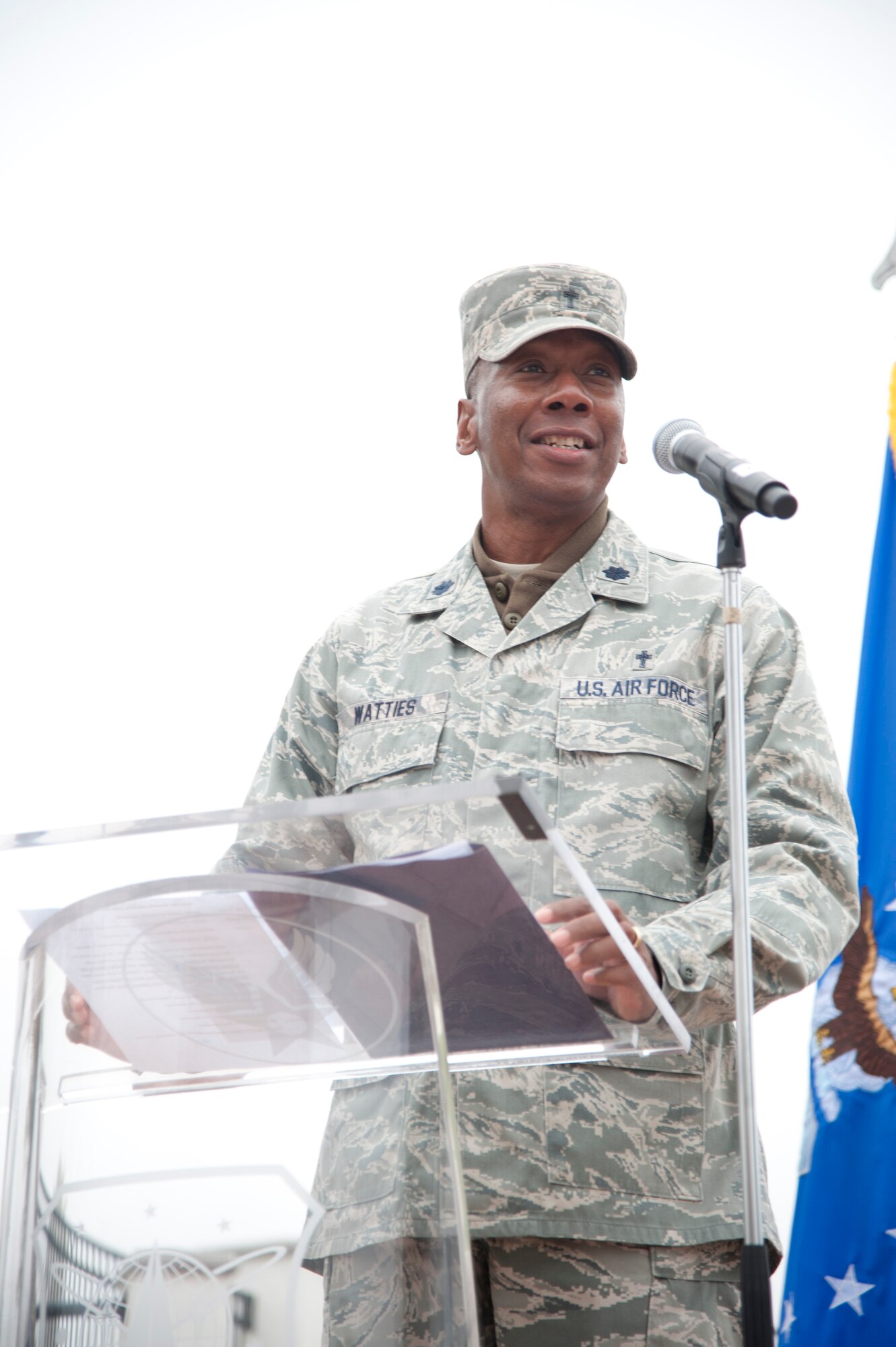 VANDENBERG AIR FORCE BASE, Calif. – Chaplain Lt. Col. Warren Watties, 30th Space Wing chaplain, greets the audience during a 9/11 Memorial Service in front of the headquarters building here Tuesday, September 11, 2012. Brig. Gen. Thomas Gould, 14th Air Force vice-commander, spoke about his experiences by the side of former President George W. Bush during the attacks 11 years ago. (U.S. Air Force photo/ Senior Airman Lael Huss)