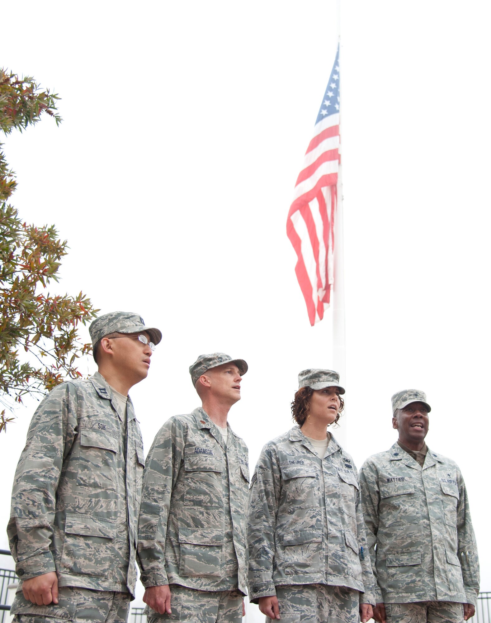 VANDENBERG AIR FORCE BASE, Calif. – Members of the 30th Space Wing Chapel sing the national anthem during the 9/11 Memorial Service at the headquarters building here Tuesday, September 11, 2012. The service was held to remember those whose lives were changed forever on September 11, 2001 and those who continue to serve to protect the lives of America’s survivors. (U.S. Air Force photo/ Senior Airman Lael Huss)