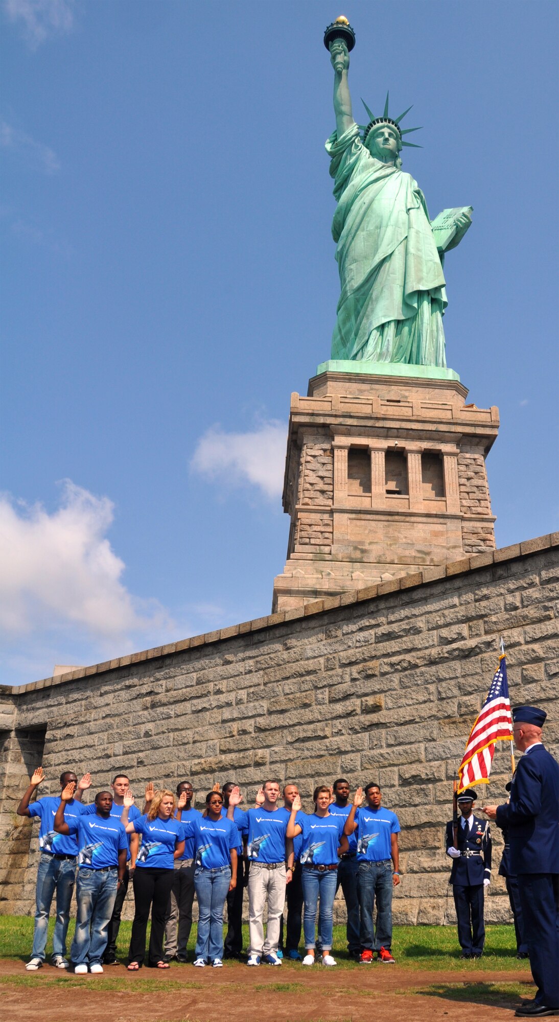 LIBERTY ISLAND, N.Y. -- Twelve new recruits take the oath of enlistment into the Air Force Reserve during an enlistment ceremony held recently in the shadow of the Statue of Liberty by recruiters from the 514th Air Mobility Wing at Joint Base McGuire-Dix-Lakehurst, N.J. The dozen Airmen join the more than 71,000 men and women currently serving in the Air Force Reserve. The recruiters at the 514th Air Mobility Wing out of Joint Base McGuire-Dix-Lakehurst, N.J. administered (U.S. Air Force photo/Master Sgt. Donna Jeffries)