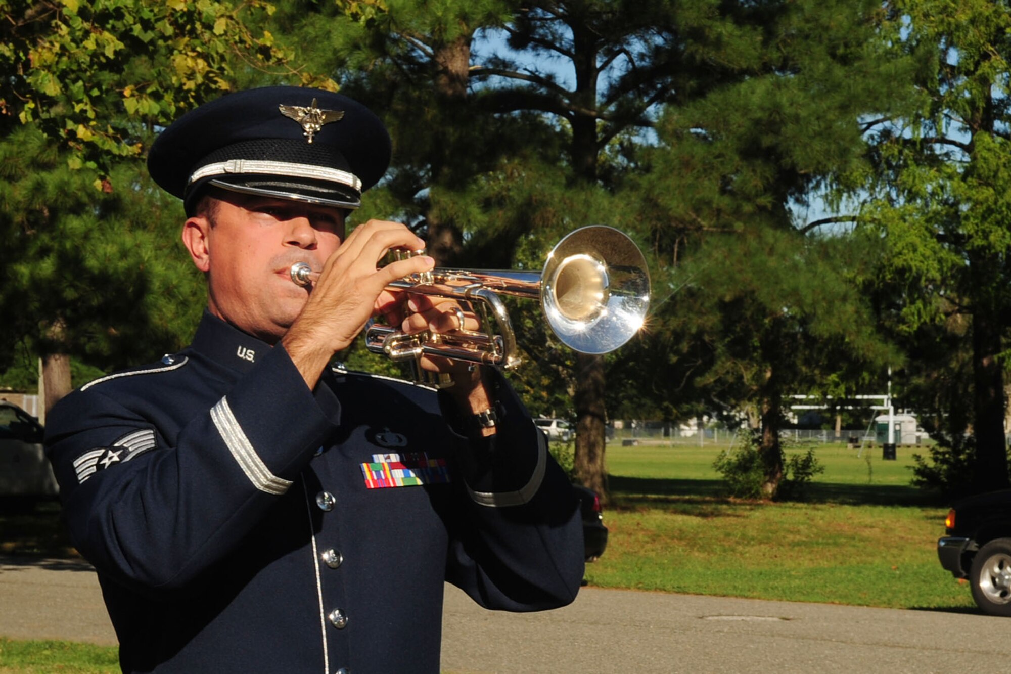 U.S. Air Force Christopher Cronsell, with the U.S. Air Force Heritage of America Band, plays Taps during the A Day of Remembrance ceremony at Gosnold’s Hope Park, Hampton, Va., Sept. 11, 2012. Members of the Veterans of Foreign Wars hold the ceremony every year in remembrance of all Service members who have sacrificed their lives protecting the country. (U.S. Air Force photo by Staff Sgt. Ashley Hawkins/Released)