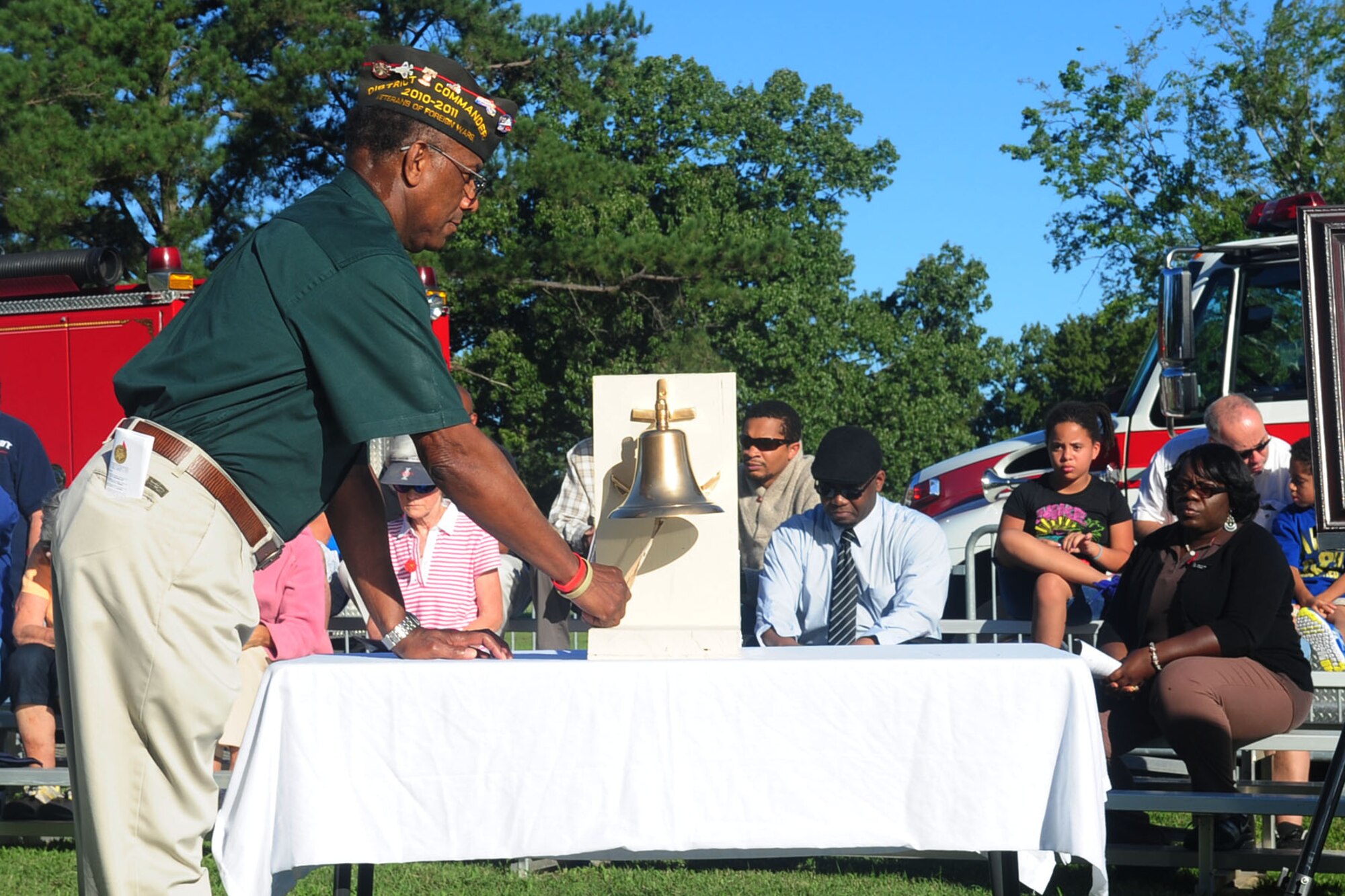 W.H. Beckwith, Veterans of Foreign Affairs commander, tolls the remembrance bell during the A Day of Remembrance ceremony at Gosnold’s Hope Park, Hampton, Va., Sept. 11, 2012. The bell was tolled at 8:46 a.m. for a moment of silence to remember the American Airlines flight that hit the North Tower of the World Trade Center in New York City. (U.S. Air Force photo by Staff Sgt. Ashley Hawkins/Released)