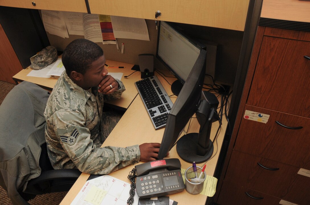 Senior Airman Dontrai Pickett, 34th Bomb Squadron scheduler, reviews the weekly aircraft maintenance schedule at the 37th Bomb Squadron maintenance scheduling office at Ellsworth Air Force Base, S.D., Sept. 7, 2012. Pickett is charged with scheduling a wide array of work performed on each of the base’s B-1 bombers, ranging from routine preventive maintenance to large –scale overhauls. (U.S. Air Force photo by Airman 1st Class Anania Tekurio/Released)