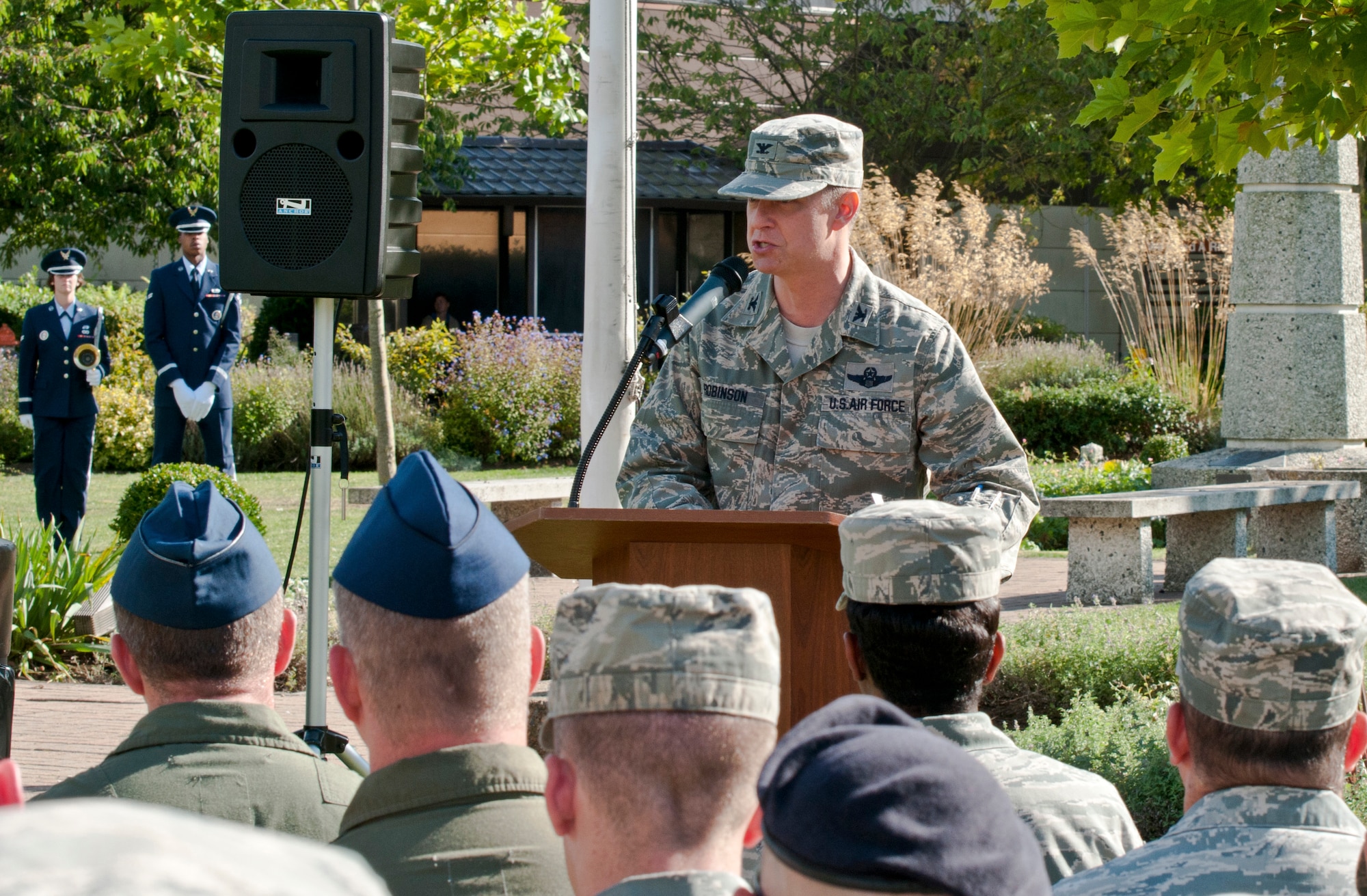 ROYAL AIR FORCE LAKENHEATH, England - Col. Kyle Robinson, 48th Fighter Wing commander, speaks before Liberty Wing Airmen during the 9/11 Remembrance Ceremony Sept. 11, 2012. The ceremony honored those lost in the attacks on Sept. 11, 2001. (U.S. Air Force photo by Senior Airman Connor Estes)