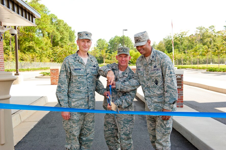 U.S. Air Force Col. Billy Thompson, 23d Wing commander, Brig. General David Howe, Headquarters Air Combat Command director of installations and mission support, and Col. Edward Ford, 23d Mission Support Group commander, cut the ribbon at the Davidson Road gate ribbon cutting ceremony at Moody Air Force Base, Ga., Sept. 7, 2012. The $10 million project is a combined effort between both military and civilian agencies, which included a new gate, visitor center and vehicle inspection facility. (U.S. Air Force photo by Staff Sgt. Joshua J. Garcia/Released)