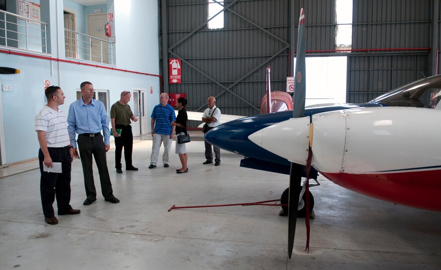 Maj. Jason Redlin and Master Sgt. Brian Miller, both from the 39th Air Base Wing safety office, check out aircraft along with other members of the 39th ABW at a flight school Sept. 10, 2012, in Adana, Turkey. Members of the 39th ABW visited the Adana airport and a flight school as part of an annual mid-air collision avoidance conference and to maintain their relationship with Turkish air traffic controllers. (U.S. Air Force photo by Senior Airman Daniel Phelps/Released)