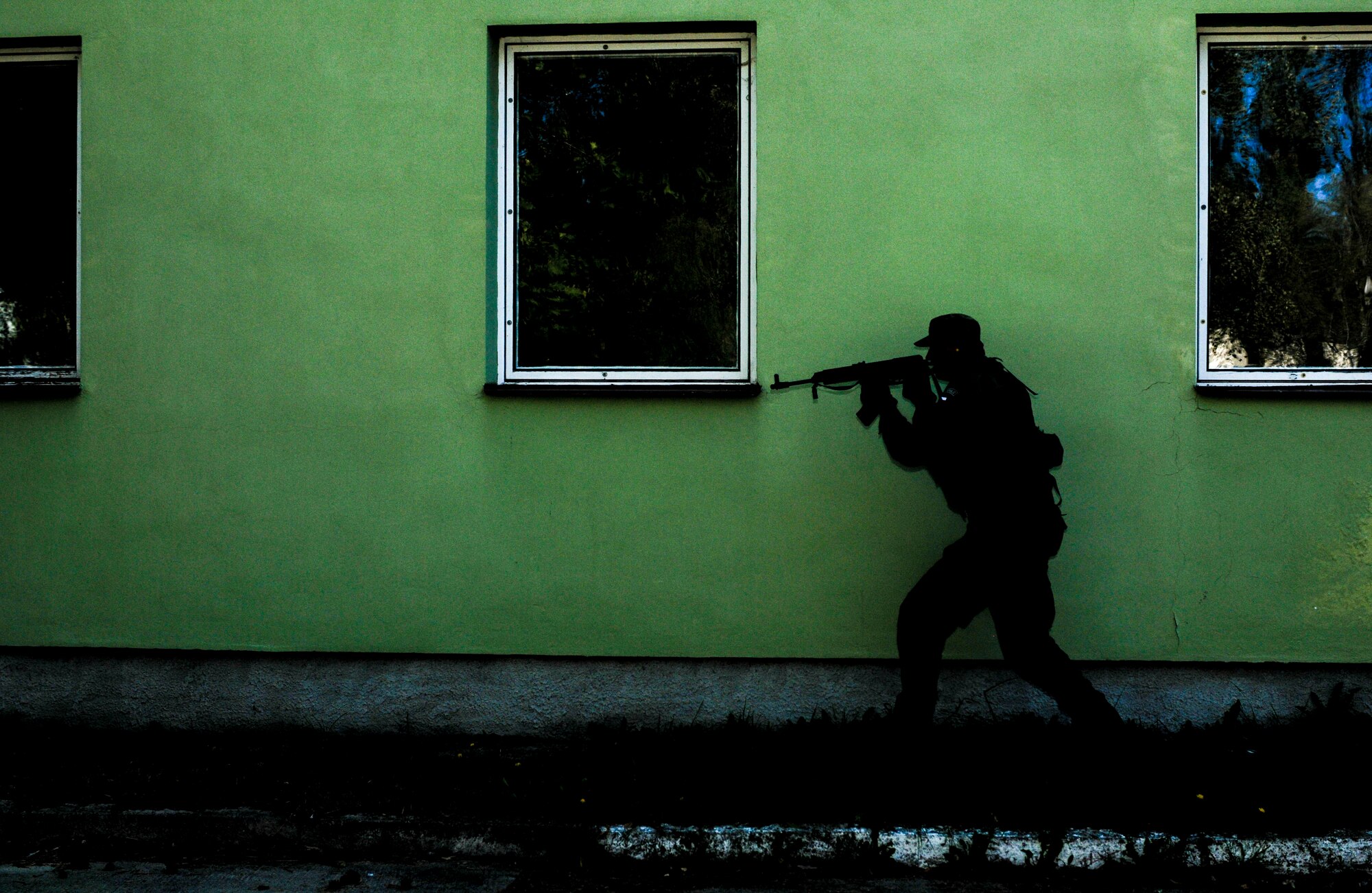 NAMEST AIR BASE, Czech Republic -- A member of the Czech Republic air force scans his sectors of fire during a forward air control training scenario a part of Ramstein Rover 2012 Sept. 11, here. During this scenario German forward air controllers, who are based out of Baumholder, Germany, communicated with Czech Republic helicopter pilots to establish targets for the ground commander while mitigating risks to civilians and civilian assets. Sixteen NATO member nations are participating in RARO 12 to include: The United States, United Kingdom, Czech Republic, Belgium, Estonia, France, Germany, Greece, Italy, Latvia, the Netherlands, Norway, Poland, Slovakia, Slovenia and Turkey. The 81st Fighter Squadron is participating in the exercise as the United States counterpart to provide close air support for forward air controllers. This squadron often conducts close air support and forward air control missions with the FACs from Baumholder. Each nation's participation in RARO 12 ensures effective employment of airpower in support of alliance or coalition forces while mitigating risks to civilians in contingency operations. (U.S. Air Force photo by Senior Airman Natasha Stannard/Released)