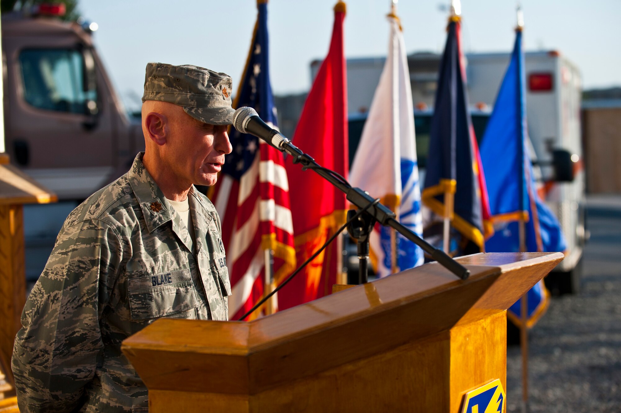 Maj. Lawrence Blake shares a prayer during a 9/11 remembrance ceremony at the Transit Center at Manas, Kyrgyzstan, Sept. 11, 2012. Service members, honored guests and Kyrgyz Republic partners attended the ceremony to honor the victims of the 9/11 terrorist attacks. Blake is a Transit Center chaplain deployed out of Minneapolis-St. Paul Air Reserve Station, Mn. (U.S. Air Force photo/Senior Airman Brett Clashman)