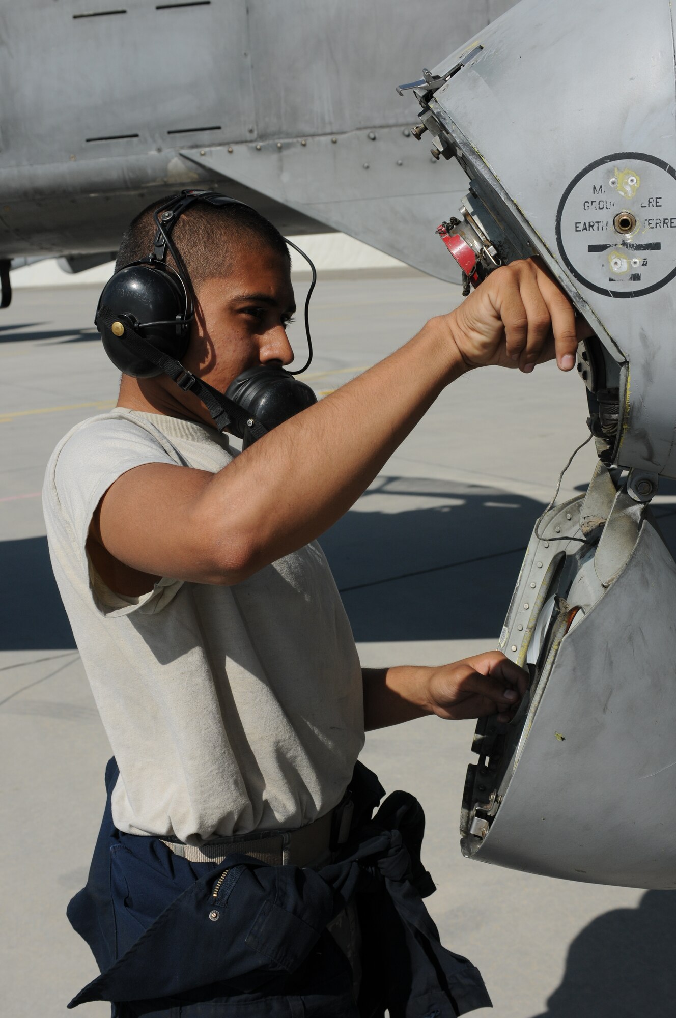 NAMEST AIR BASE, Czech Republic -- Airman 1st Class Fernando Sorto, 81st Fighter Squadron avionics technician, makes sure avionics systems are in working order be an A-10 Thunderbolt II takes off for a close air support exercise mission Sept. 10, during Ramstein Rover 2012 here. During this mission the A-10s provided support to German and Italian forward air controllers. RARO12 is a NATO partnership building exercise involving more than 16 nations. A-10 Thunderbolt IIs from the 81st FS are participating in the exercise to provide close air support to partnering nations and practice forward air control missions with their NATO allies in international security assistance force realistic scenarios. Participating in exercises like RARO12 ensures effective employment of airpower in support of alliance or coalition forces while mitigating risks to civilians in contingency operations. (U.S. Air Force photo by Senior Airman Natasha Stannard/Released)