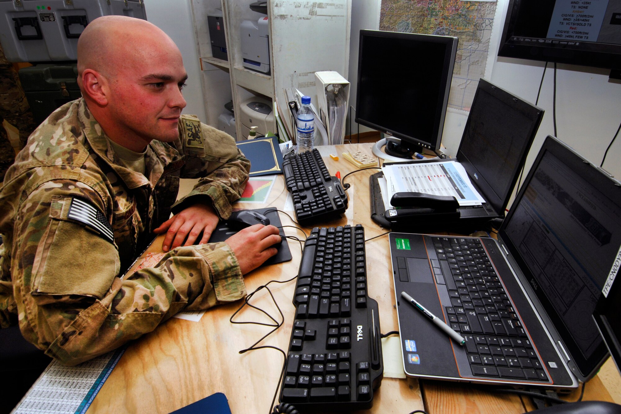 SSgt Jason Goddard, 19th Expeditionary Weather Squadron battlefield weather forecaster, keeps an eye on aircraft and weather patterns along aircraft routes at Bagram Airfield, Afghanistan, Sept 12, 2012. Goddard supports Task Force Talon by integrating time-sensitive, mission-critical weather intelligence into deliberate operations and mission planning.  His responsibilities include maintaining weather situational awareness more than 111,000 square miles, and more than 100 forward operation bases; the largest area of responsibility of any weather support cell in country. (U.S. Air Force photo/SSgt Jeff Nevison)