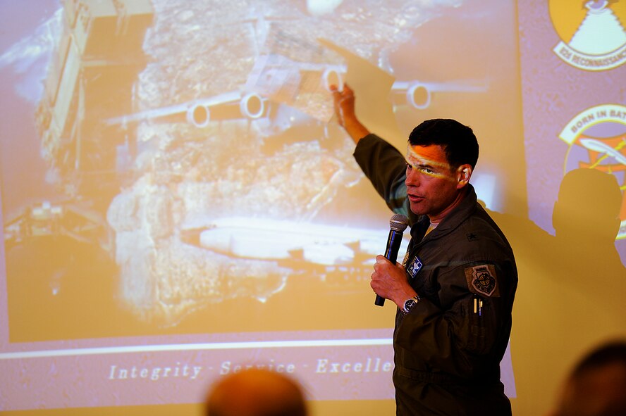 U.S. Air Force Brig. Gen. Matt Molloy, 18th Wing commander, gives a wing mission briefing during the Honorary Commander orientation tour on Kadena Air Base, Japan, Sept. 7, 2012. During the tour, more than 30 local Okinawan leaders caught a glimpse of the wing's mission through demonstrations by the 18th Civil Engineer Group and the 18th Security Forces Squadron's military working dogs. The visitors were also treated to a showcase of a Kadena F-15C Eagle and Joint Base Langley-Eustis F-22 Raptor on Kadena's flightline. (U.S. Air Force photo/ Senior Airman Maeson L. Elleman)