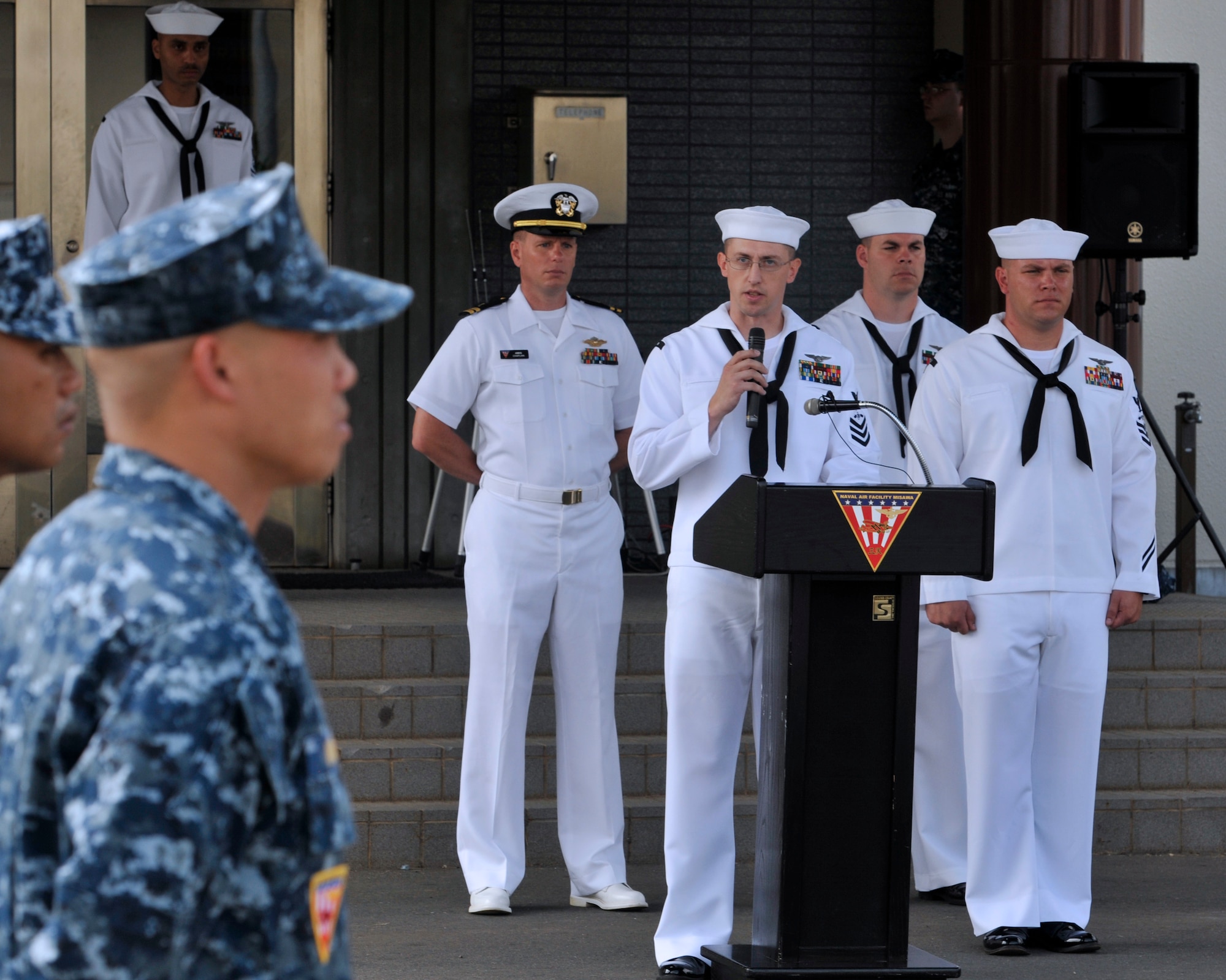 Chief (select)Aviation Electronics Technician Mike Ferrell, a native of Springfield, Ore., reads a speech originally given by President George W. Bush in the wake of the 9/11 terrorist attacks at Naval Air Facility Misawa, Japan, Sept. 11, 2012.  Navy Misawa chief petty officer selectees conducted a 9/11 Remembrance Ceremony to commemorate the 11th anniversary of the Sept. 11, 2001 terrorist attacks. (U.S. Navy photo by Mass Communication Specialist 2nd Class Pedro A. Rodriguez/RELEASED)