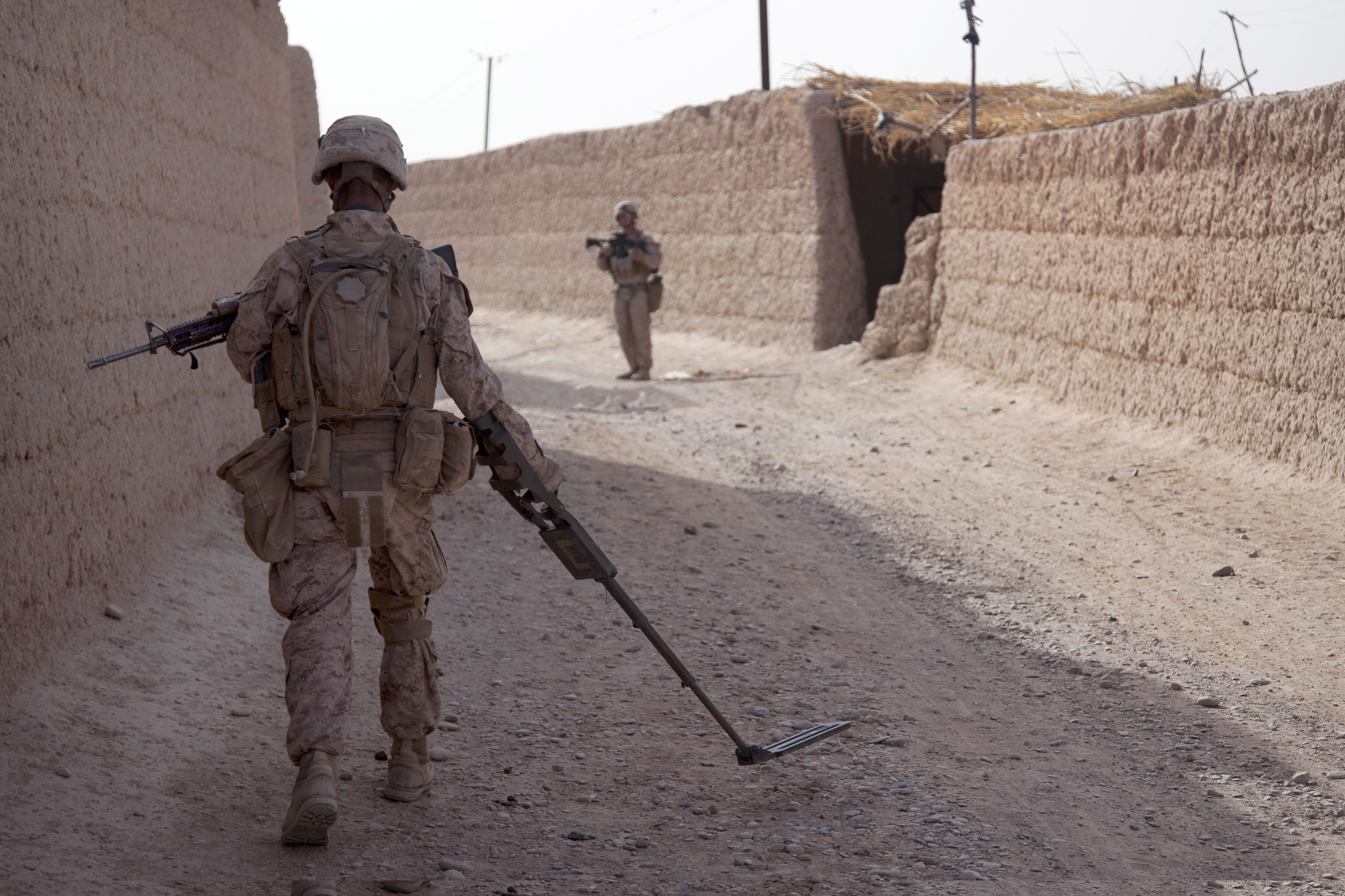 U S Marine Corps Lance Cpl Jason Aguilar Left Clears A Path With A Combat Metal Detector When we have a large war, we will send in the marines in those missions that we know will have a high casualty rate. 2