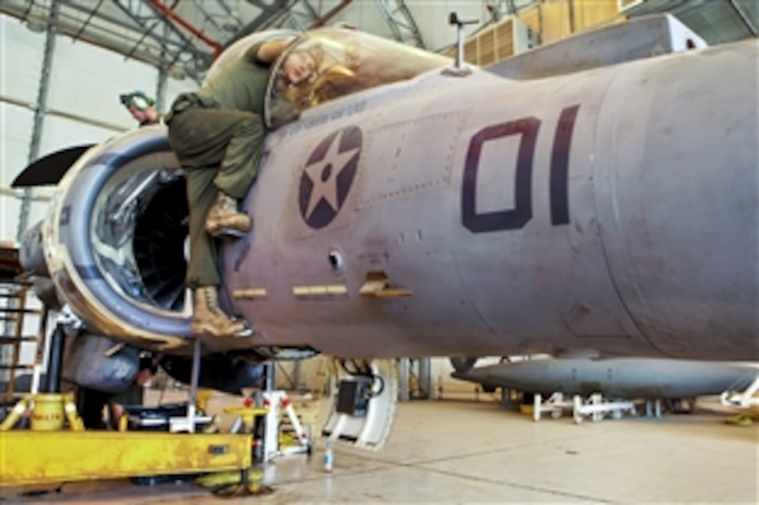 U.S. Marine Corps Cpl. Shawn M. Smith performs a function check on an AV-8B Harrier aircraft on Camp Bastion in Afghanistan's Helmand province, Sept. 3, 2012. Smith, a power line mechanic, is assigned to Marine Attack Squadron 211, Marine Aircraft Group 13, 3rd Marine Aircraft Wing.