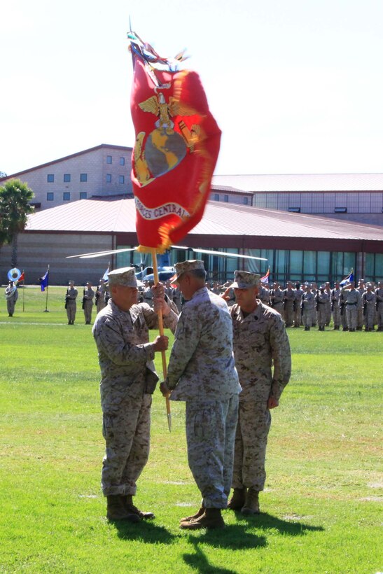 Lt. Gen. Thomas D. Waldhauser (center), outgoing commander of Marine Corps Forces Central Command and I Marine Expeditionary Force, relinquishes I MEF to Lt. Gen. John A. Toolan, Jr. (left), during a change-of-command ceremony at Camp Pendleton, Calif., Sept. 7.  Lt. Gen. Waldhauser will proceed to Washington D.C., and report as the senior military assistant to the Secretary of Defense.