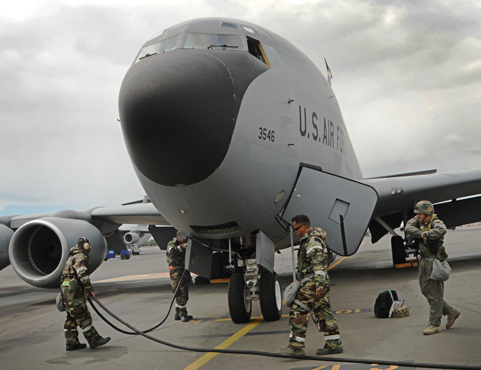 Airmen from the 154th Maintenance Squadron and the 203rd Air Refueling Squadron participate in the Operational Readiness Exercise on Joint Base Pearl Harbor-Hickam, Hawaii, Sept. 13. During the exercise, Airmen had to don protective gear to protect against a simulated chemical attack, while still performing their normal maintenance duties on the KC-135 Stratotanker. (U.S. Air Force photo/Senior Airman Lauren Main)