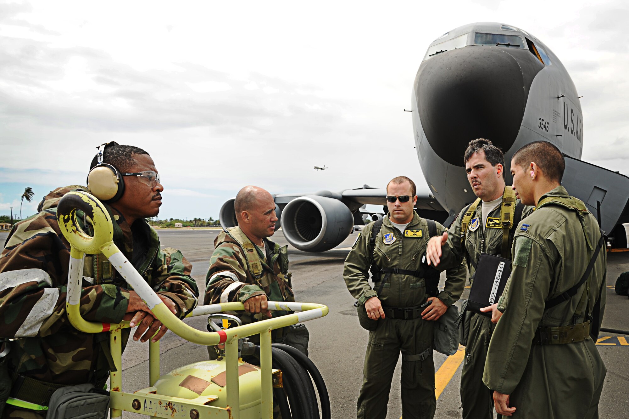 Airmen from the 154th Maintenance Squadron and the 203rd Air Refueling Squadron participate in the Operational Readiness Exercise on Joint Base Pearl Harbor-Hickam, Hawaii, Sept. 13. During the exercise, Airmen had to don protective gear to protect against a simulated chemical attack, while still performing their normal maintenance duties on the KC-135 Stratotanker. (U.S. Air Force photo/Senior Airman Lauren Main)
