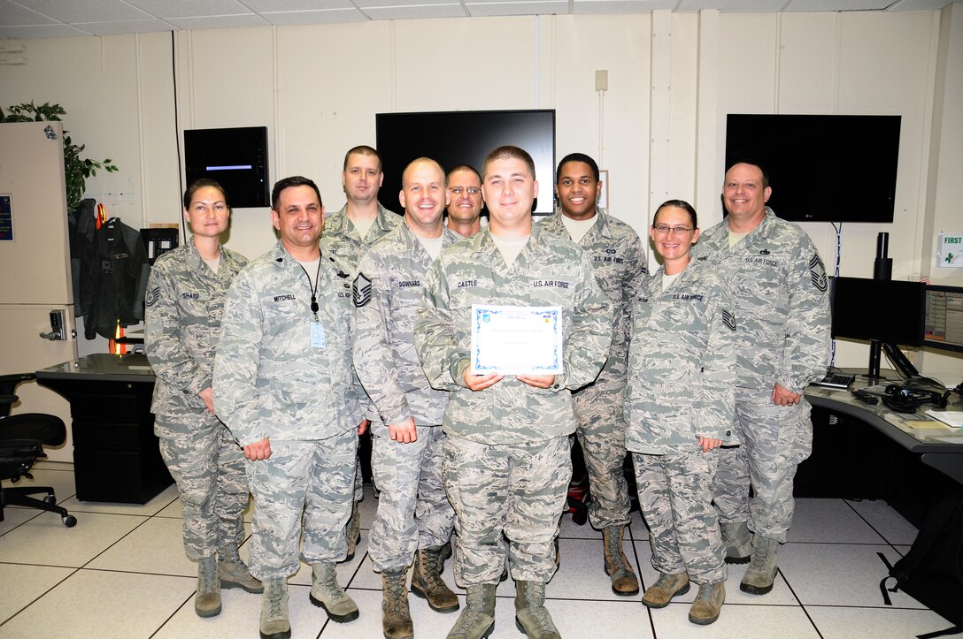 ANDERSEN AIR FORCE BASE, Guam -- Staff Sgt. Dustin Castle, 734th Air Mobility Squadron Command and Control training noncommissioned officer in charge, was awarded Team Andersen’s Best here Sept. 6. Andersen's Best is a recognition program which highlights a top performer from the 36th Wing. Each week, supervisors nominate a member of their team for outstanding performance and the wing commander presents the selected Airman/civilian with an award. To nominate your Airman/civilian for Andersen's Best, contact your unit chief or superintendent explaining their accomplishments. (U.S. Air Force photo by Airman 1st Class Mariah Haddenham/Released)