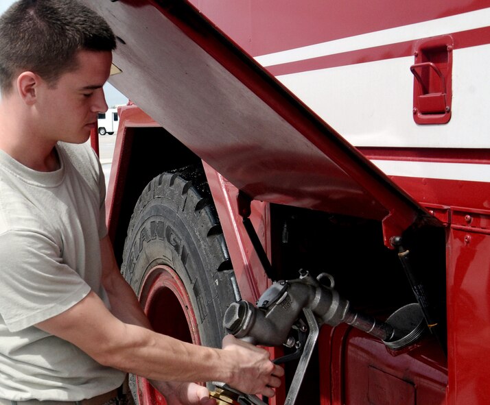 ANDERSEN AIR FORCE BASE, Guam – An Airman from the 36th Logistics Readiness Squadron’s fuel distribution element fuels a fire truck here, Sept. 7. Andersen AFB is the home of the largest fuel storage facility in the Air Force. (U.S. Air Force photo by Airman 1st Class Mariah Haddenham/Released)