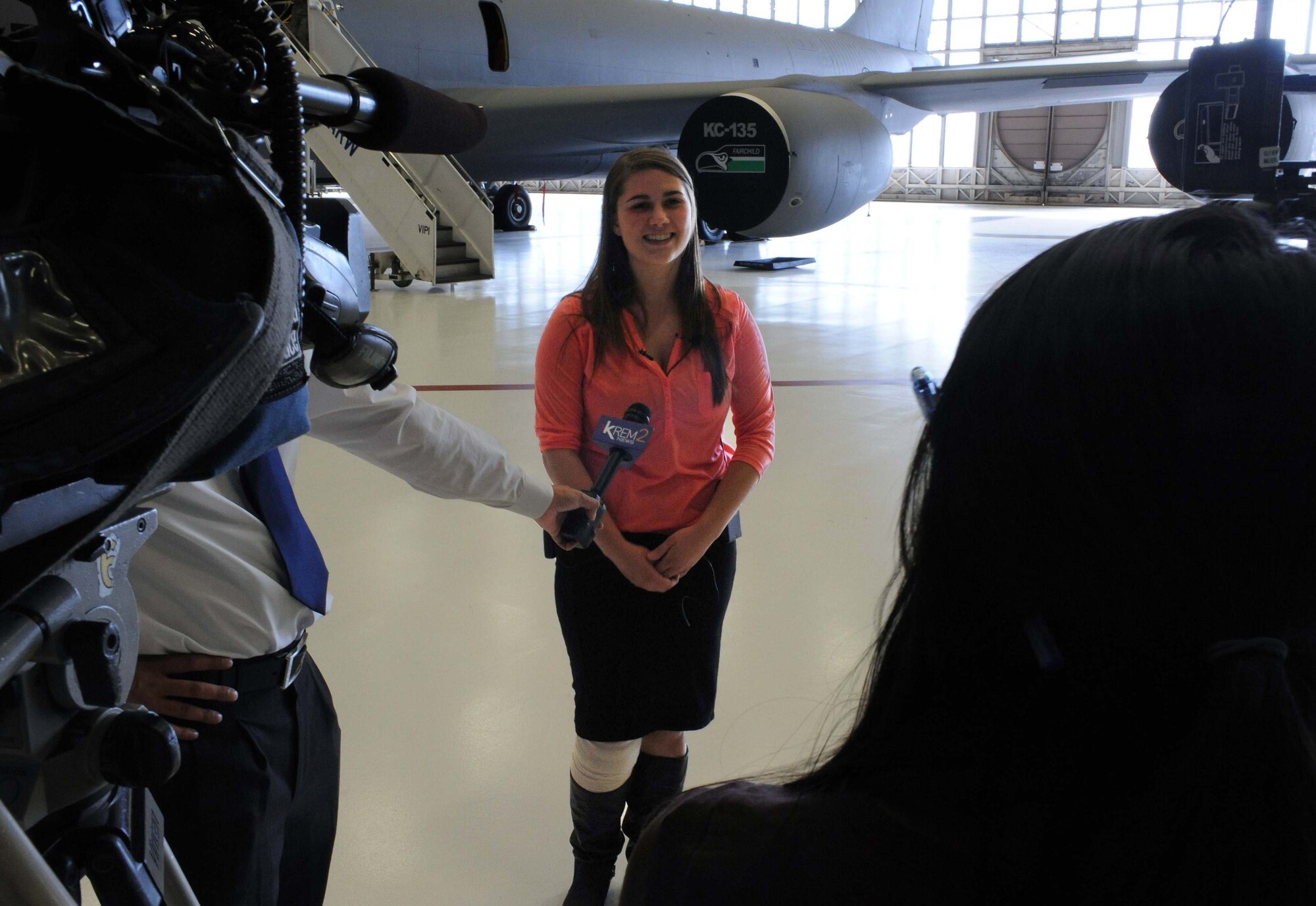 Jessica Davidson, 2012 Lewis and Clark High School graduate from Spokane, Wash., is interviewed by local media outlets during her visit at Fairchild Air Force Base, Wash., Sept. 11, 2012. Davidson was invited by the 92nd Air Refueling Wing commander, Col. Brian Newberry, for her work sending care packages to servicemembers deployed to the U.S. military’s Central Command. (U.S. Air Force photo by Senior Airman Benjamin Stratton)