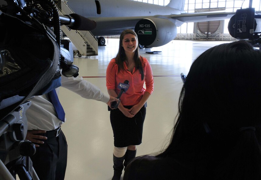 Jessica Davidson, 2012 Lewis and Clark High School graduate from Spokane, Wash., is interviewed by local media outlets during her visit at Fairchild Air Force Base, Wash., Sept. 11, 2012. Davidson was invited by the 92nd Air Refueling Wing commander, Col. Brian Newberry, for her work sending care packages to servicemembers deployed to the U.S. military’s Central Command. (U.S. Air Force photo by Senior Airman Benjamin Stratton)