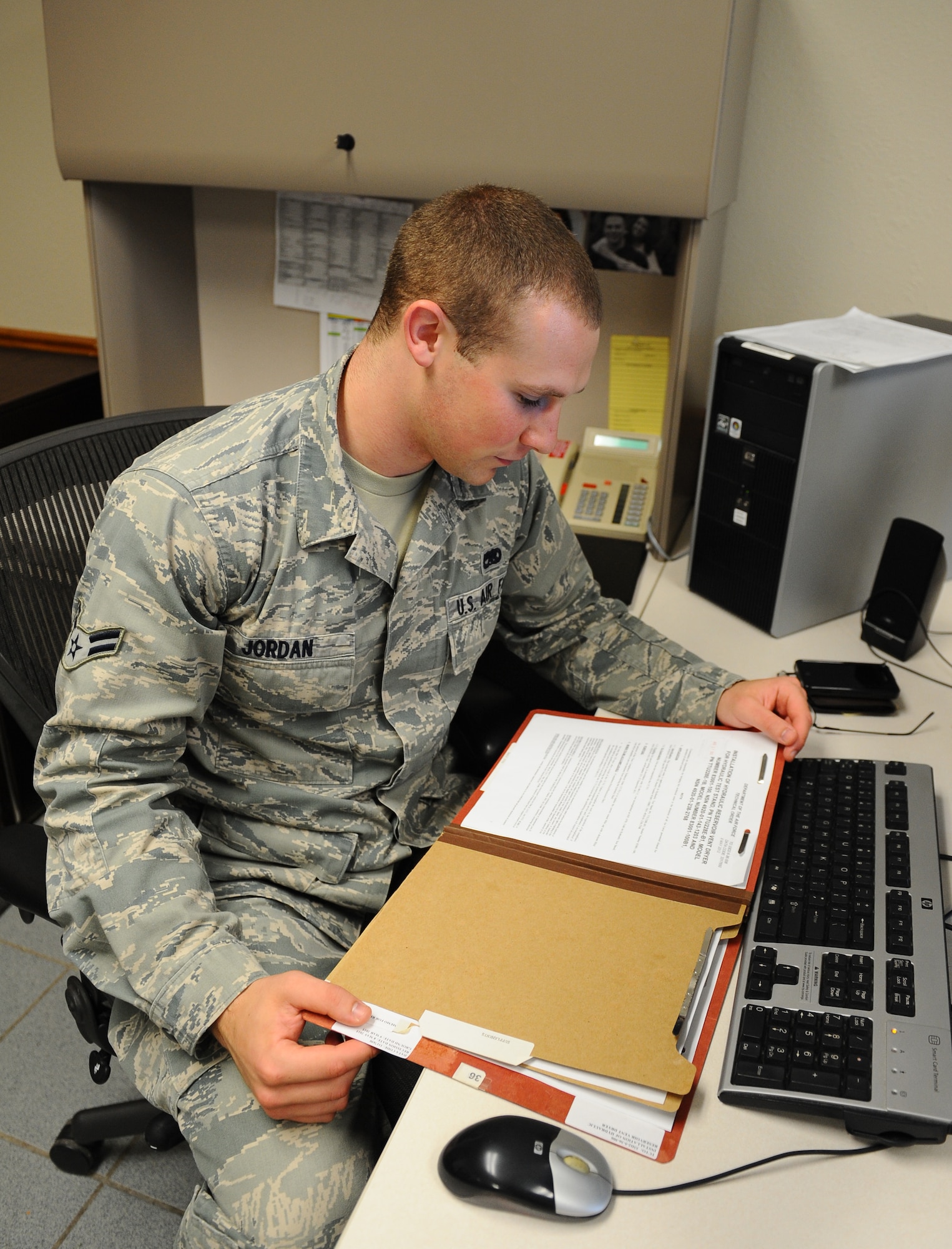 Airman 1st Class Ben Jordan, 2nd Maintenance Operations Squadron assistant time compliance technical order monitor, reviews a TCTO on Barksdale Air Force Base, La., Sept. 6. A TCTO is a request for a major modification on either an aircraft or piece of equipment that needs to be completed within a designated amount of time. (U.S. Air Force photo/Airman 1st Class Benjamin Gonsier)(RELEASED)