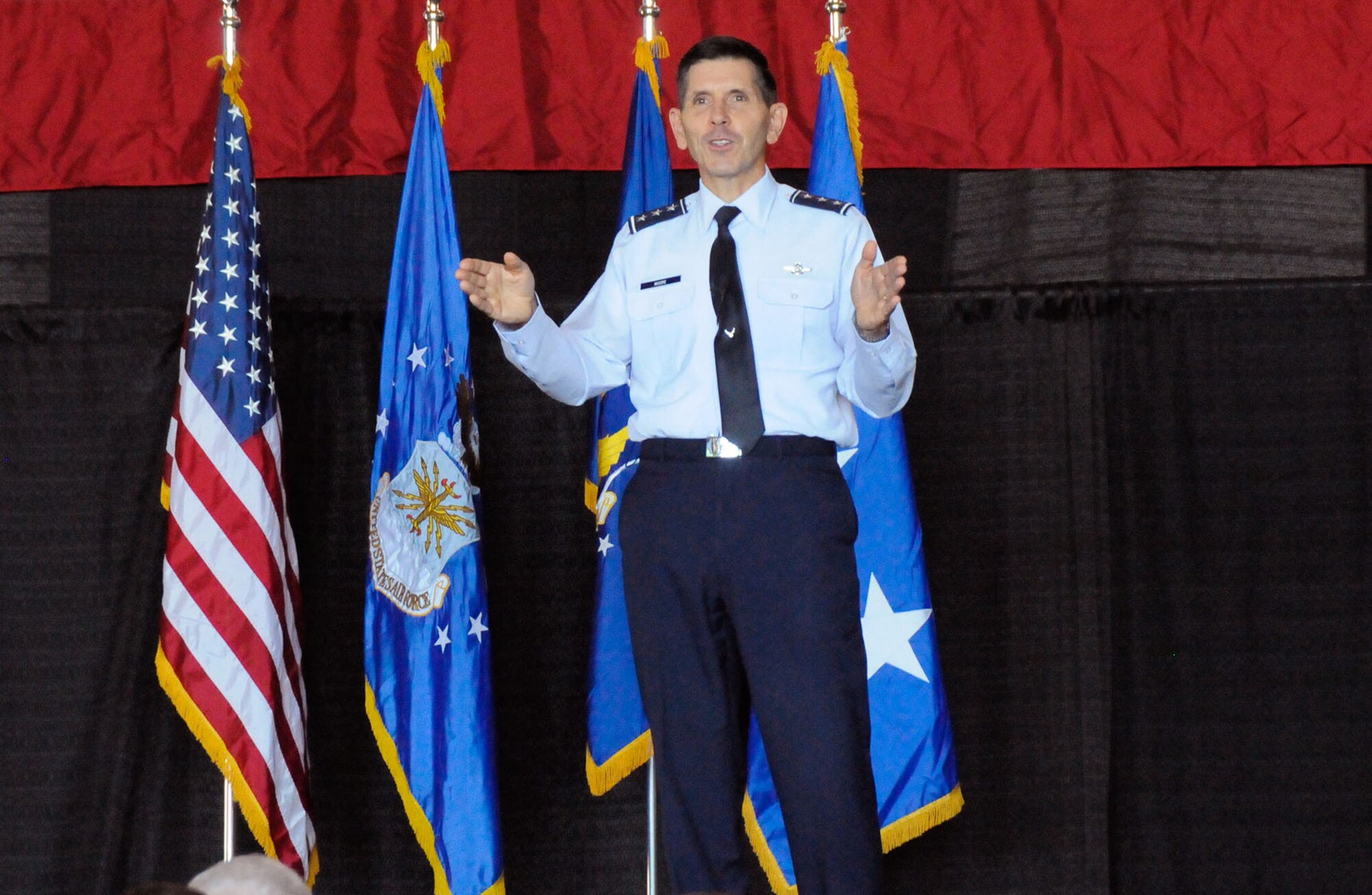 HANSCOM AIR FORCE BASE, Mass. -- Lt. Gen. C.D. Moore II, Air Force Life Cycle 
Management Center commander, speaks about the new organization during a town 
hall meeting Sept. 11 at the Aero Club Hangar. Moore spoke about initiatives, 
challenges and working together under the new construct. (U.S. Air Force photo 
by Linda LaBonte Britt)
