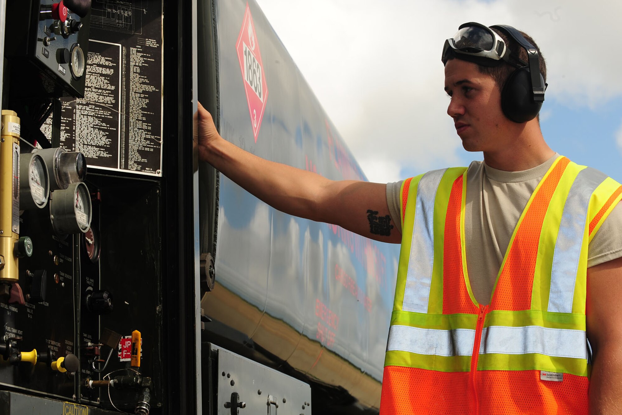 U.S. Air Force Airman 1st Class Jeremiah Garfoyle, 633rd Logistic Readiness Squadron refueling operator, monitors fuel pressures and flow rates during a Hydrant Mobile Refueler procedure at Langley Air Force Base, Va., Sept. 13, 2012. Langley is the first base to have the HYMORE system attached to its R-11 fuel trucks and perform the procedure, which could revolutionize flight line operations. (U.S. Air Force photo by Staff Sgt. Ashley Hawkins/Released)