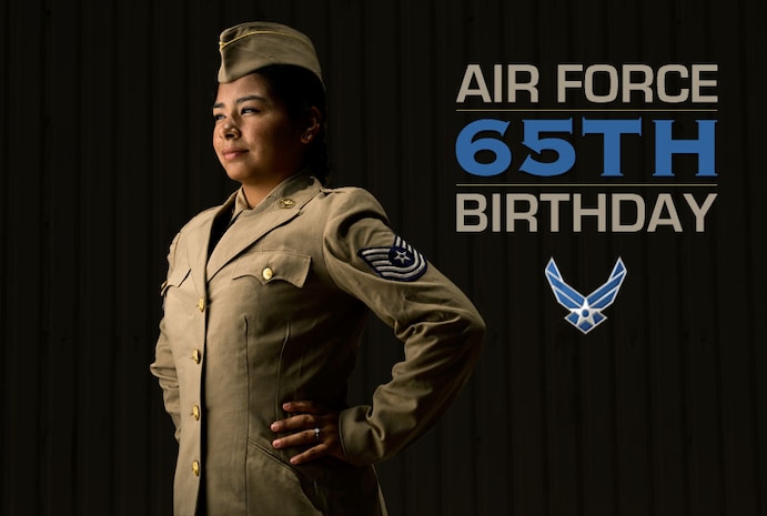 Doris Hernandez models a Khaki Shade 1 Women in the Air Force transition uniform worn between 1947 and 1950. (U.S. Air Force photo/Tech. Sgt. Bennie J. Davis III)