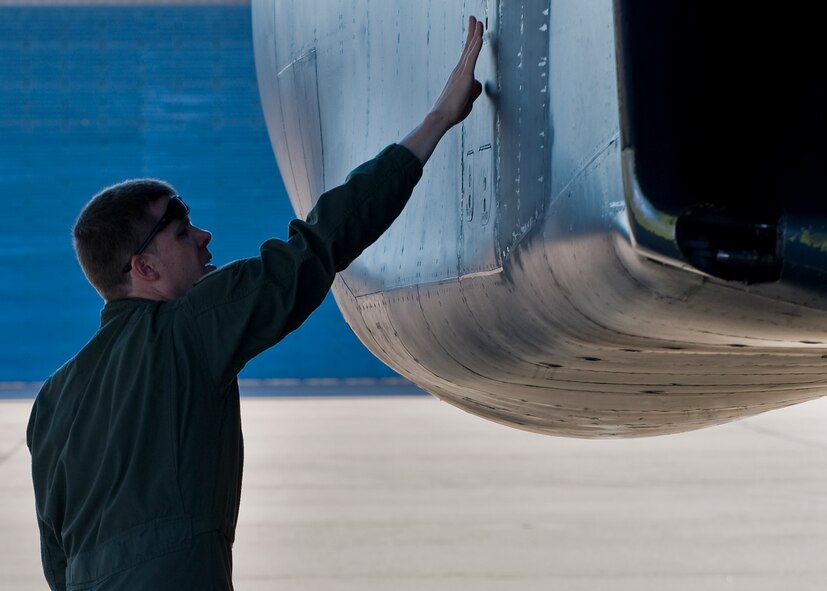 U.S. Air Force Maj. Jon Hougon, 337th Test and Evaluation Squadron, conducts a pre-flight check of a B-1 Bomber prior to competing in the 3rd annual Global Strike Challenge Sept. 7, 2012, at Dyess Air Force Base, Texas. The 337th TES is one of four Dyess squadrons competing in the GSC. (U.S. Air Force photo by Airman 1st Class Charles V. Rivezzo/Released) 


