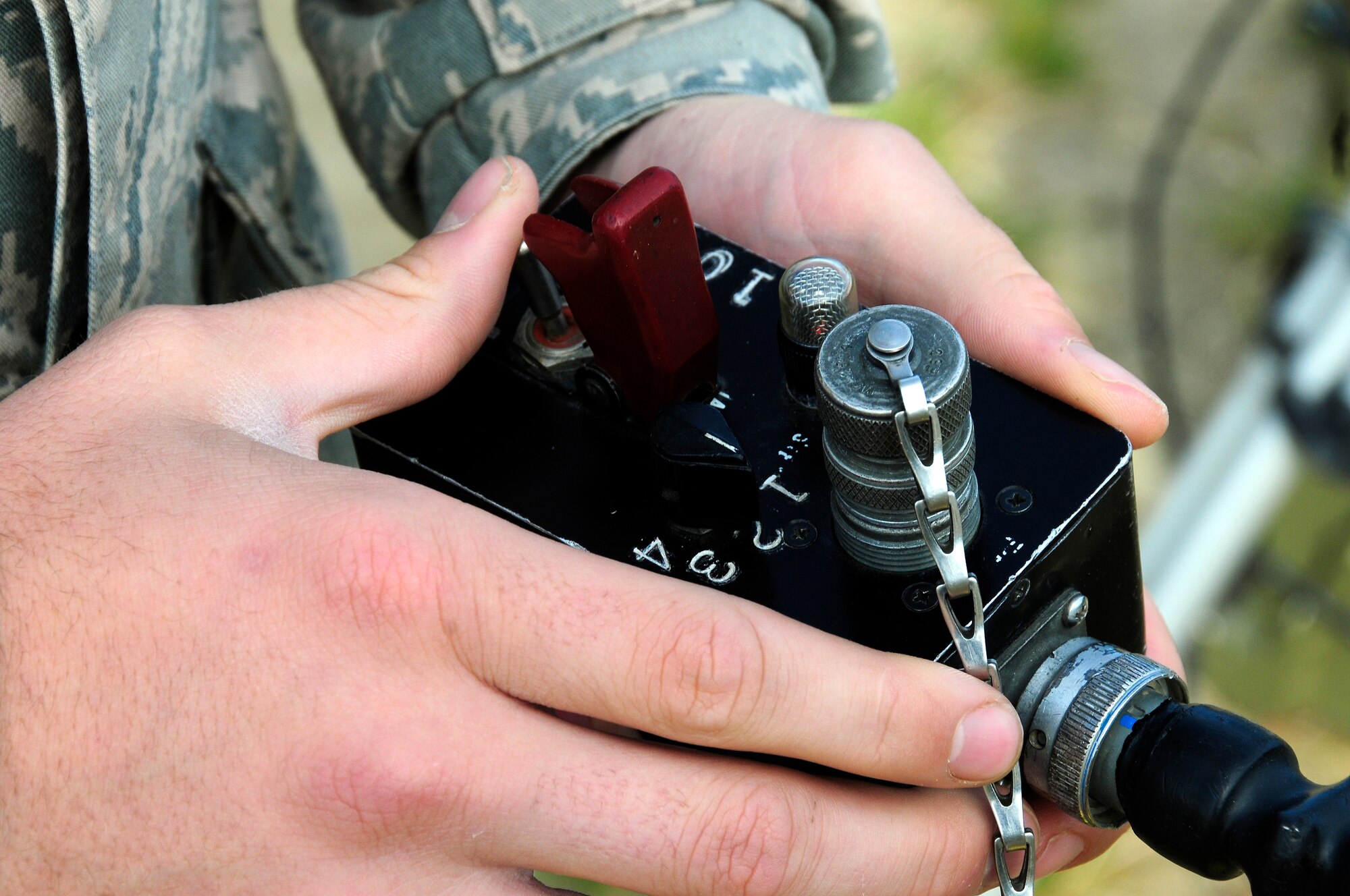 U.S. Air Force Airman 1st Class Brandon Larsen, 353rd Combat Training Squadron range division quality assurance evaluator, prepares to launch a GTR-18 Smokey Sam Aug. 17, 2012, Eielson Air Force Base, Alaska. Smokey Sams visually simulate the launch of a surface-to-air missile to provide realistic training for pilots. (U.S. Air Force photo/Airman 1st Class Zachary Perras)