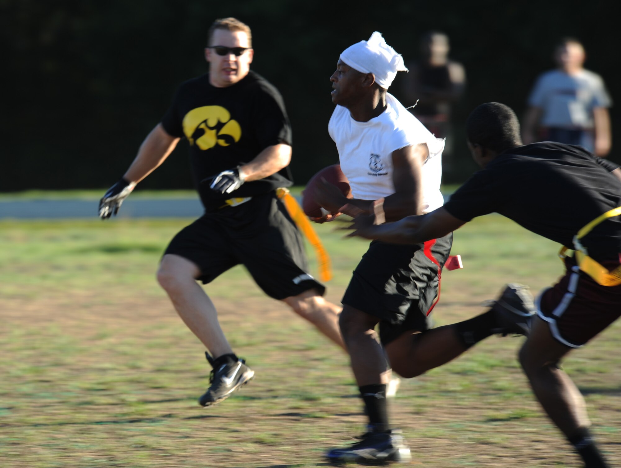 WHITEMAN AIR FORCE BASE, Mo. -- Jerome Whitfield, 509th MDG quarterback, scrambles against the 509th Force Support Squadron Sept. 10. Whitfield completed on a long touchdown pass later in the  game to clinch a 12-0 victory. (U.S. Air Force photo/Airman 1st Class Bryan Crane)(Released)