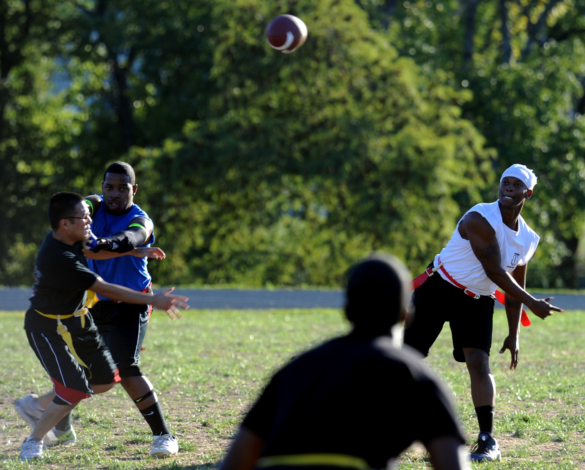 WHITEMAN AIR FORCE BASE, Mo. -- Jerome Whitfield, 509th Medical Group quarterback, attempts a pass in their opening game of the season Sept. 10. The 509th MDG would go on to defeat the 509th Force Support Squadron 12-0. (U.S. Air Force photo/Airman 1st Class Bryan Crane) (Released)
