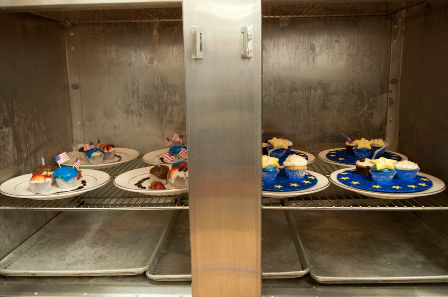 Finished cupcakes wait to be served to the judges for the Cupcake Wars competition at the Georgia Pines Dining Facility Aug. 28, 2012, at Moody Air Force Base, Ga. Four teams competed to win over the judges with three different cupcakes that had to be prepared, baked and presented in 60 minutes. (U.S. Air Force photo by Airman 1st Class Paul Francis/Released)
