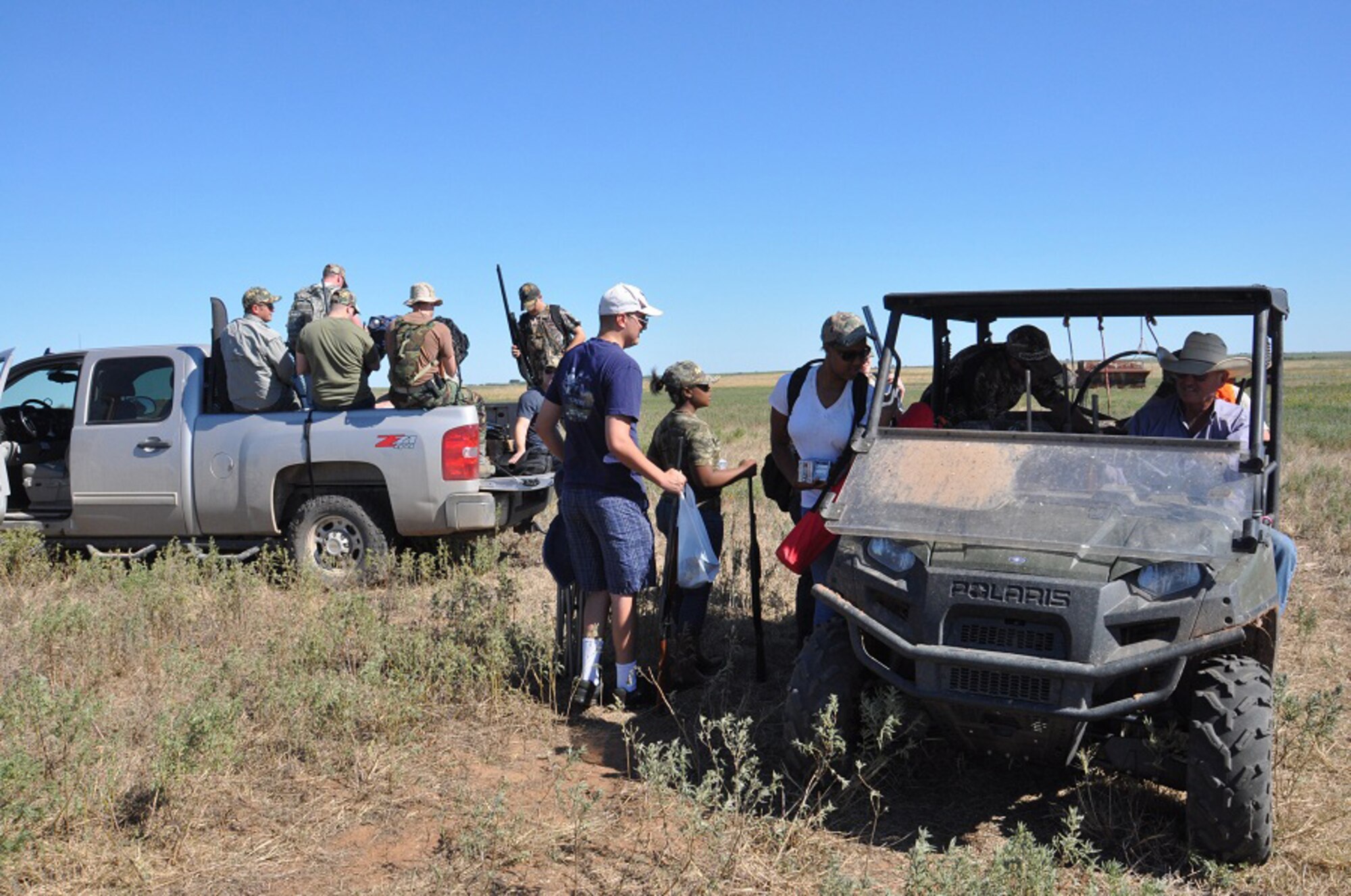 Birdwell-Clark Ranch owner, Emry Birdwell, loads Sheppard Air Force Base
personnel into his jeep in preparation for the 8th annual Dove Salute Sep.
8, 2012, in Henrietta, Texas.  Each year, 175 base personnel are invited to
dove hunt, explore the Texas ranch lifestyle and feast on steak dinners by
area Clay County ranchers who loan guns, provide ammo and prepare the dinner
as a way to show appreciation to those serving in the military. (U.S. Air
Force photo/Debi Smith)