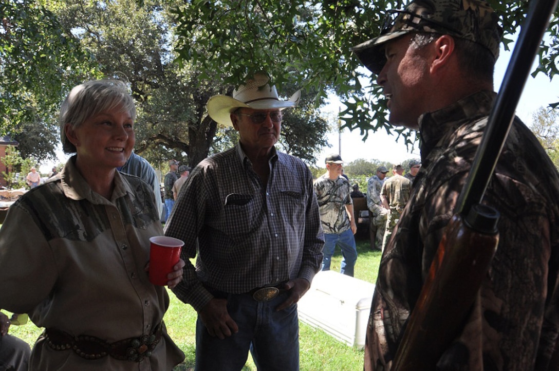 Birdwell-Clark Ranch owners, Deborah Clark and Emry Birdwell, discuss the
annual Dove Salute preparations with Sheppard Air Force Base commander,
Brigadier General Michael Fantini Sep. 8, 2012.. Celebrating its 8th year, the Clay County event hosted 175 military personnel for a free day of dove hunting, skeet
shooting and dinner to share the north Texas ranch lifestyle and show
appreciation for the sacrifices of those serving in the military. (U.S. Air
