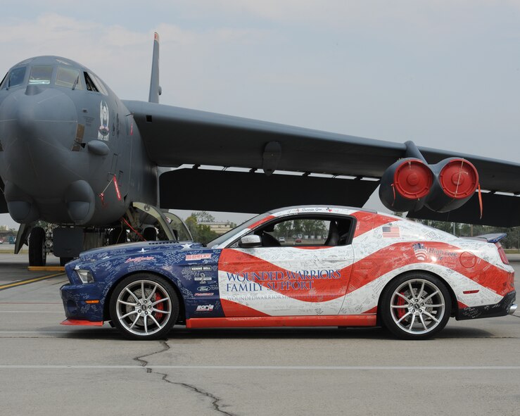 MINOT AIR FORCE BASE, N.D. - Team Minot welcomed here the Wounded Warrior Family Support Team and its 2012 Ford Mustang GT500 Super Snake, Sept. 11. The Wounded Warrior Family Support Team helps families of military personnel who are injured or killed by giving them financial help in the wake of adversity. (U.S. Air Force photo/Airman 1st Class Andrew Crawford)