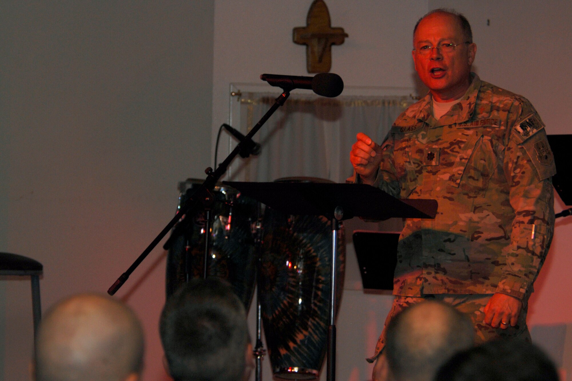 Chaplain (Lt. Col.) James Glass, 455th Air Expeditionary Wing, delivers the keynote message during a “9/11” memorial observance at Bagram Airfield, Afghanistan, Sept. 11, 2012. Chaplain Glass spoke about military members answering their nation’s call to serve others and potentially lay down their lives. His message, “Hate what is evil and cling to what is good,” urged everyone to be careful to keep their heart pure as they perform their mission and live their lives. (U.S. Air Force photo/SSgt Jeff Nevison)