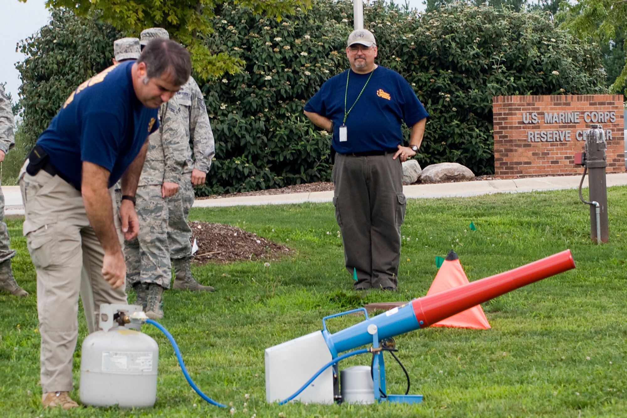 GRISSOM AIR RESERVE BASE, Ind. ? Daniel DeAngulo, Grissom's base emergency manager, adjusts a liquid propane tank attached to a bird deterrent cannon here Sept. 5. In preparation for an upcoming exercise the 434th Civil Engineer Squadron tested their bird cannons, which will take the place of ground burst simulators. The bird cannons may also be used by base safety for Grissom?s bird air strike hazard program to startle birds out of the airfield area. (U.S. Air Force photo/Staff Sgt. Carl Berry)
