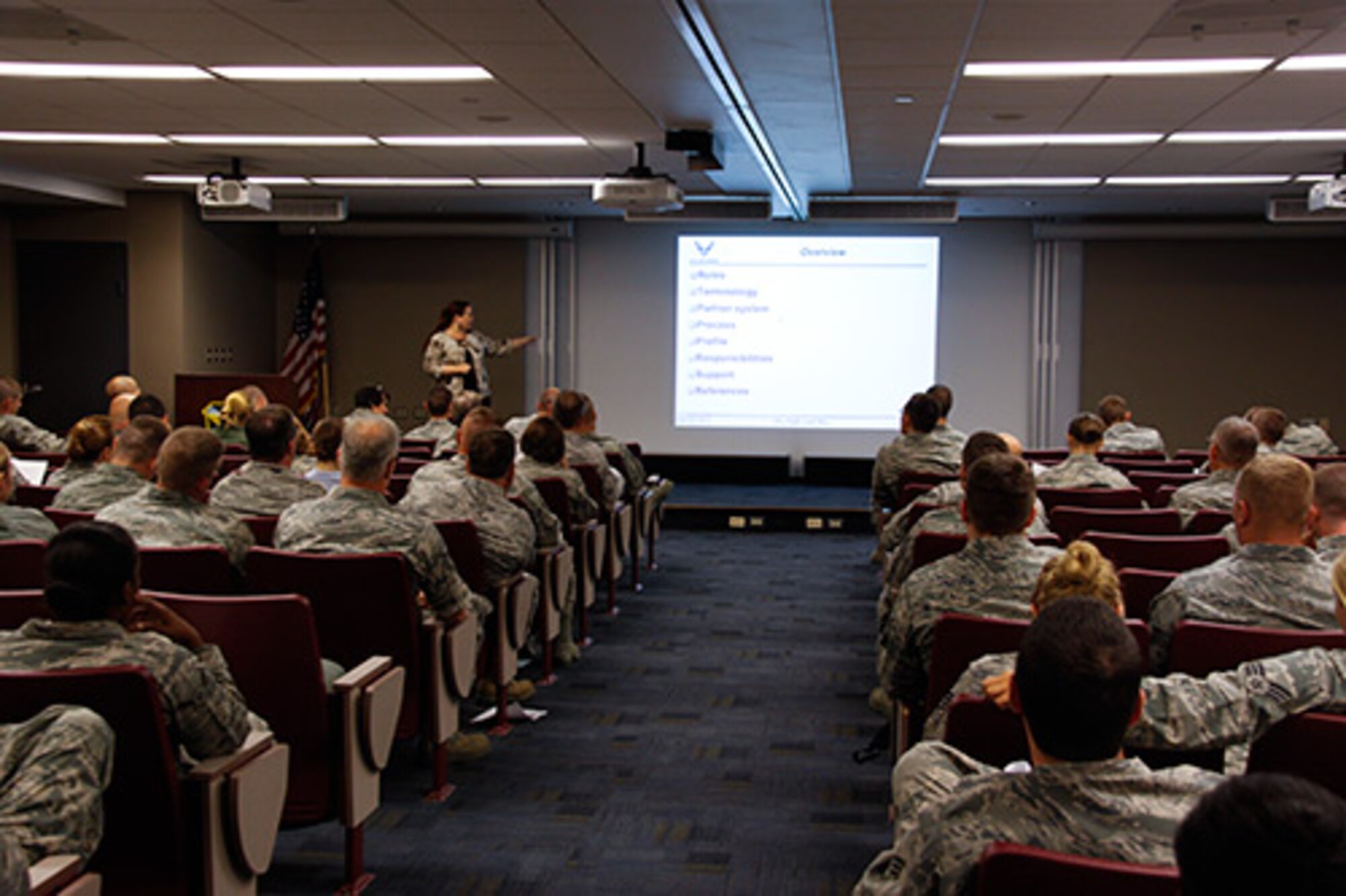 Maureen Ryan, Air Force Reserve Command contracted training specialist, briefs 911th Airlift Wing Airmen on the new Defense Travel System, Sept. 9, 2012. The DTS will be a new way for reservists on base to submit travel vouchers for reimbursement of expenses incurred while on duty. The system will create a smoother and more user-friendly process for Airmen, eliminating the need for paper. Use of the DTS will become effective Oct. 1, 2012. (U.S. Air Force photo by Senior Airman Justyne Obeldobel/Released)