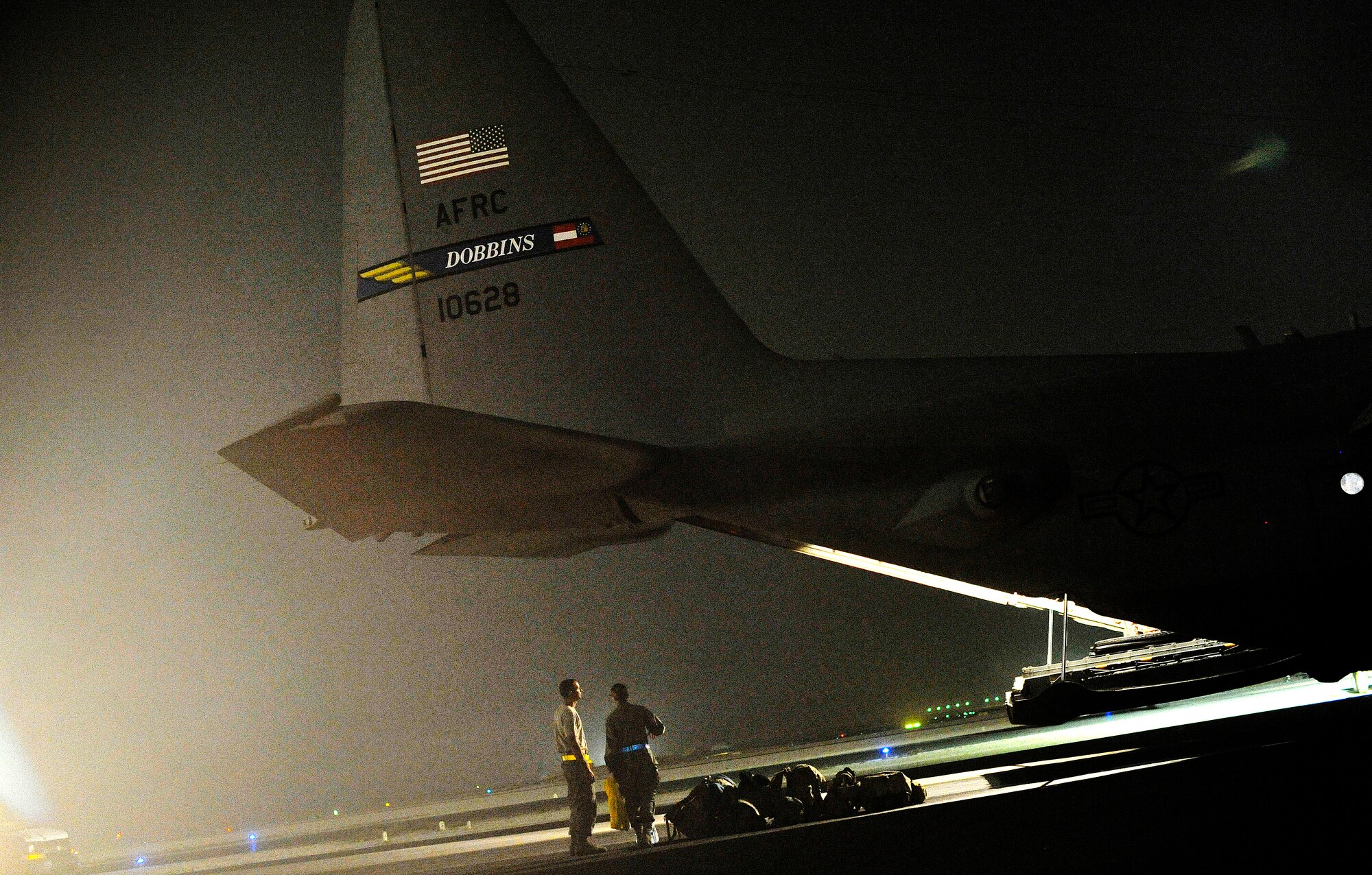 U.S. Air Force members with the 379th Expeditionary Medical Group perform pre-flight processing procedures for four U.S. Army members from the Inter Theater Care Program (ITCP), undisclosed location, Southwest Asia, August 30, 2012. The members are part of ITCP because they suffered from combat related injuries in the AOR. The ITCP was established in order to care for injured troops, who were able to be rehabilitated and returned to their respective units within the AOR.   (U.S. Air Force photo/Staff Sgt. Clay Lancaster/ Released)
