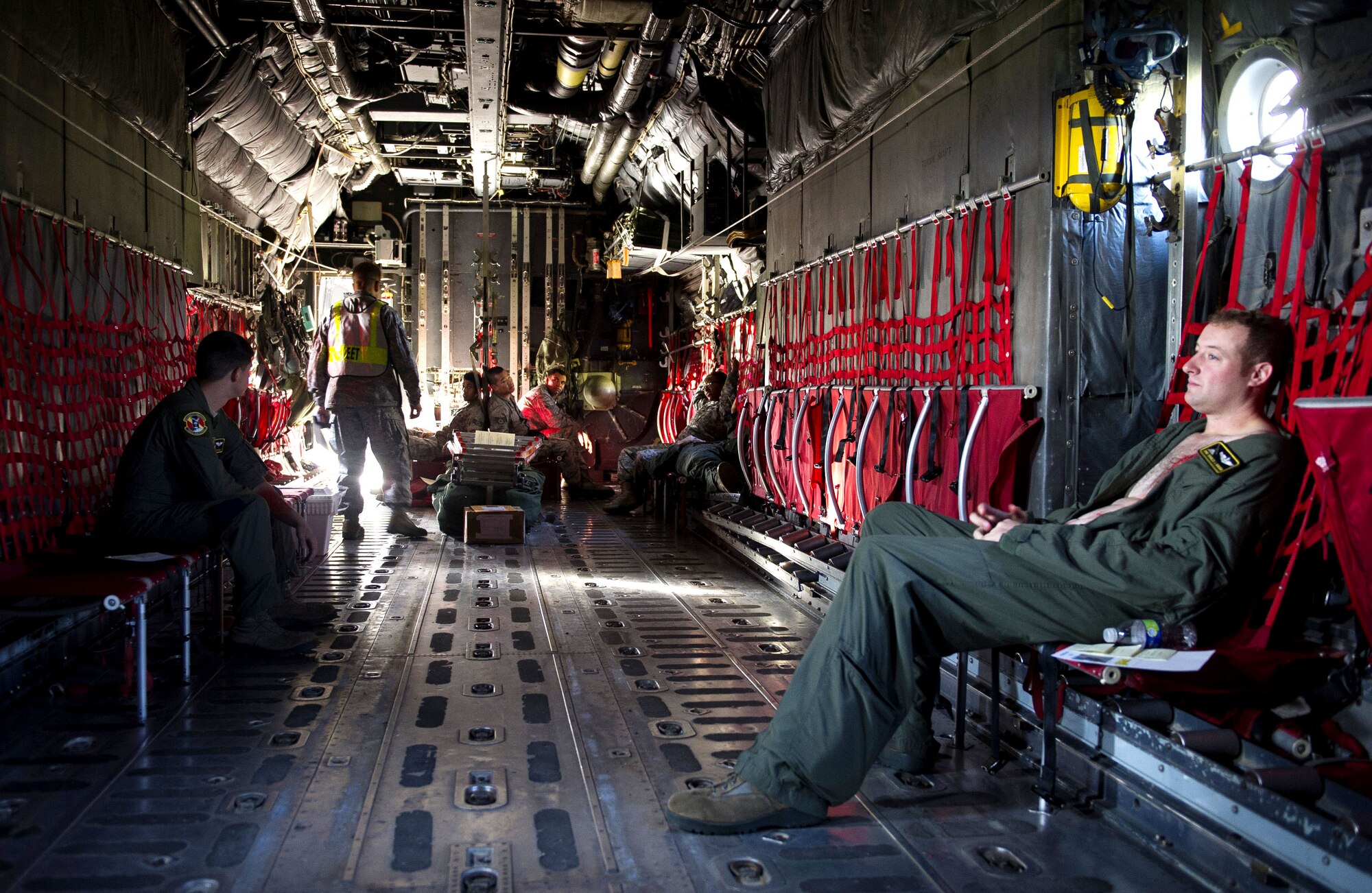 YOKOTA AIR BASE, Japan – Simulated victims wait inside a C-130 Hercules prior to a mass casualty scenario during an emergency management exercise at Yokota Air Base, Japan on Sept. 13, 2012. Role players function as a key component to adding a sense of realism to the exercise. (U.S. Air Force photo by Staff Sgt. Chad C. Strohmeyer)