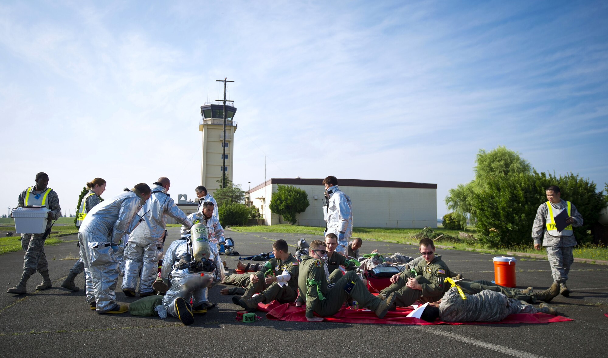 YOKOTA AIR BASE, Japan – 374th Civil Engineer Squadron firefighters aid simulated victims during an emergency management exercise at Yokota Air Base, Japan on Sept. 13, 2012. The exercise allowed Yokota's emergency responders a chance to practice managing the various complexities of a mass casualty scenario. (U.S. Air Force photo by Staff Sgt. Chad C. Strohmeyer)