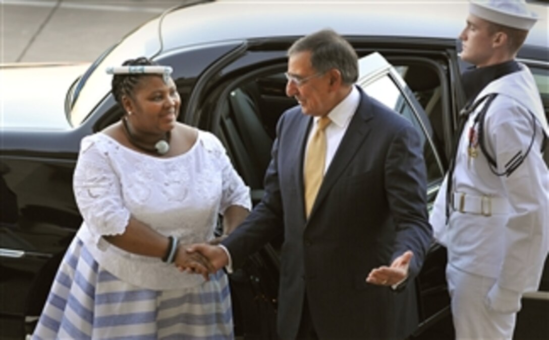 Secretary of Defense Leon E. Panetta welcomes South Africa's Minister of Defense Nosiviwe Mapisa-Nqakula as she arrives at the Pentagon on Sept. 12, 2012.  Panetta and Mapisa-Nqakula will meet to discuss security items of interest to both nations.  