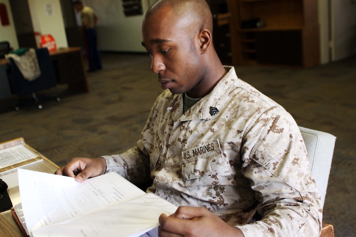 Sgt. Joseph Rice, academic instructor, Support Battalion, reviews his history class for recruits of Company C, 1st Recruit Training Battalion, aboard Marine Corps Recruit Depot San Diego, Sept. 7. Rice attempted to relate history topics to current events in order to give recruits an event in their lifetime to compare it to.