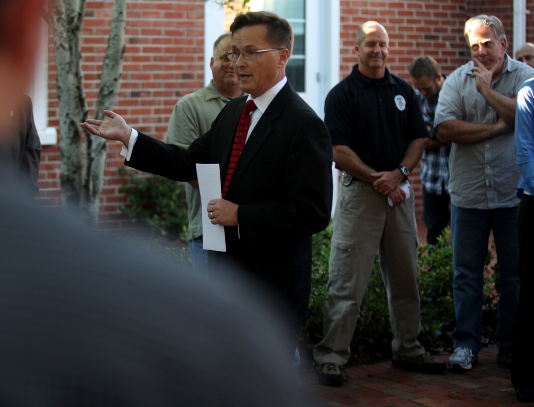 Ernie Lee, a district attorney and speaker at the Law Enforcement Fellowship dinner aboard Marine Corps Base Camp Lejeune, thanks first responders and Naval Criminal Investigative Service agents for their bravery in honor of those who gave their lives on 9/11 during the dinner Sept. 11. Lee said those officials do the hardest job of all when it comes to the investigative process.