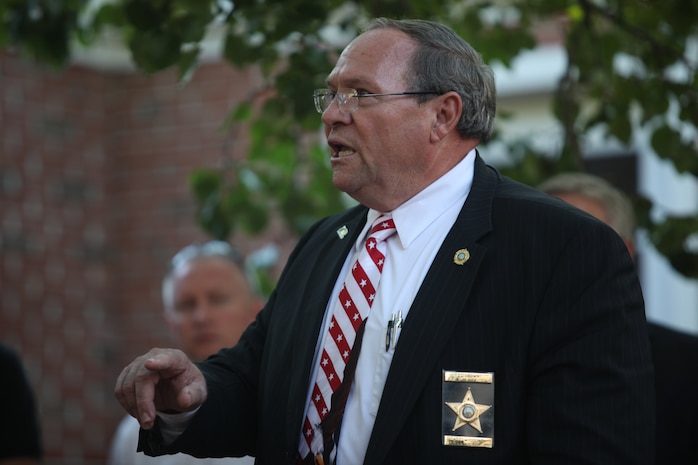 Ed Brown, Onslow County sheriff who spoke at the Law Enforcement Fellowship dinner aboard Marine Corps Base Camp Lejeune, thanks first responders and Naval Criminal Investigative Service agents for doing the job they do and being willing to perform such dangerous tasks during the dinner Sept. 11. Brown said he is grateful for the people who keep the community safe.