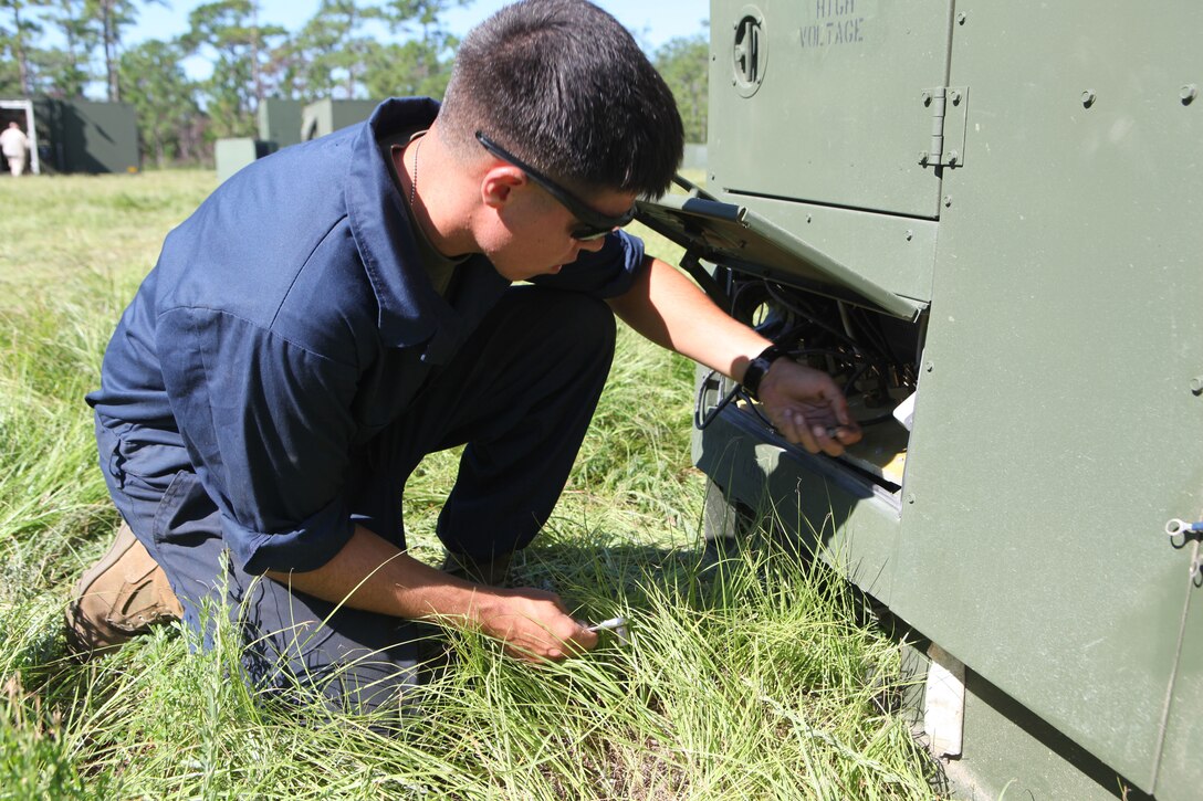 Pfc. Broc R. Sargent, an engineer mechanic with Combat Logistics Regiment 25, 2nd Marine Logistics Group, disassembles a generator during a training exercise aboard Camp Lejeune, N.C., Sept. 11, 2012.  The exercise tested the Marines capabilities to perform in a deployed environment without affecting their operational tempo.
