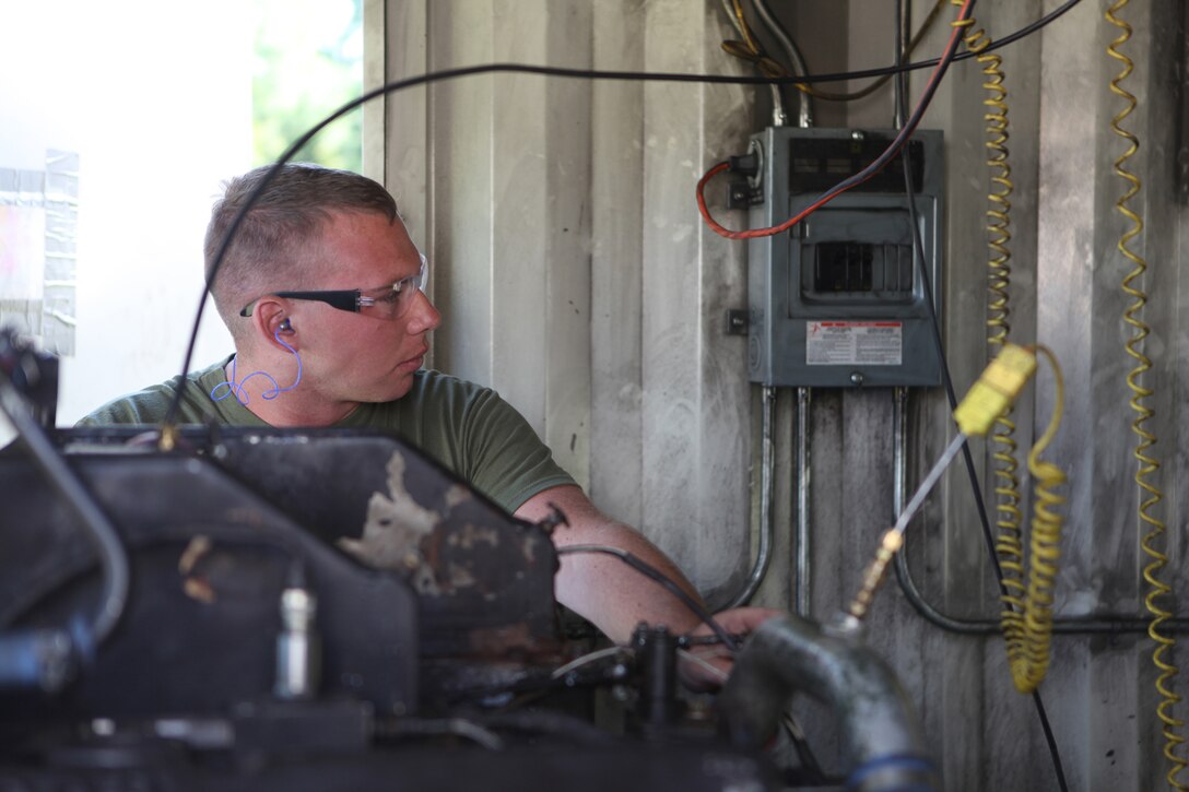 Cpl. Lee A. Nagelkerk, a motor vehicle mechanic with 2nd Maintenance Battalion, 2nd Marine Logistics Group, tests an engine during a training exercises aboard Camp Lejeune, N.C., Sept. 12, 2012.  Nagelkerk used a dynamometer, which measures the mechanical force of different types of engines.