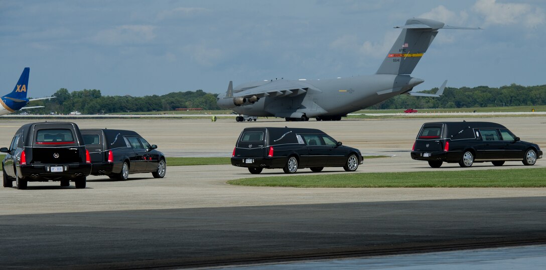 The remains of four U.S. State Department members killed in Libya depart the hanger, Sept. 14, 2012, at Joint Base Andrews, Md. The U.S. State Department held a ceremony on base to honor the Americans who gave their lives in service to their country. (U.S. Air Force photo by Senior Airman Perry Aston) 