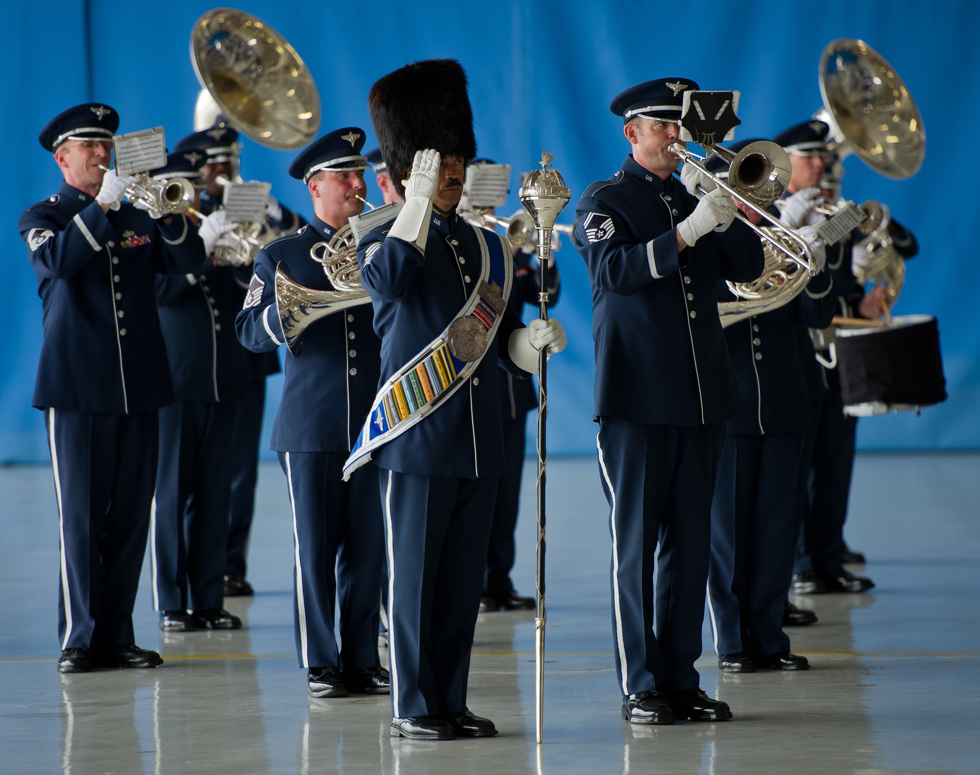 The United States Air Force Band plays the National Anthem during the dignified transfer of the remains for J. Christopher Stevens, U.S. ambassador to Libya, and three other Americans, Sept. 14, 2012, at Joint Base Andrews, Md. The U.S. State Department held a ceremony on base to honor the Americans who gave their lives in service to their country. (U.S. Air Force photo/Senior Airman Perry Aston)
